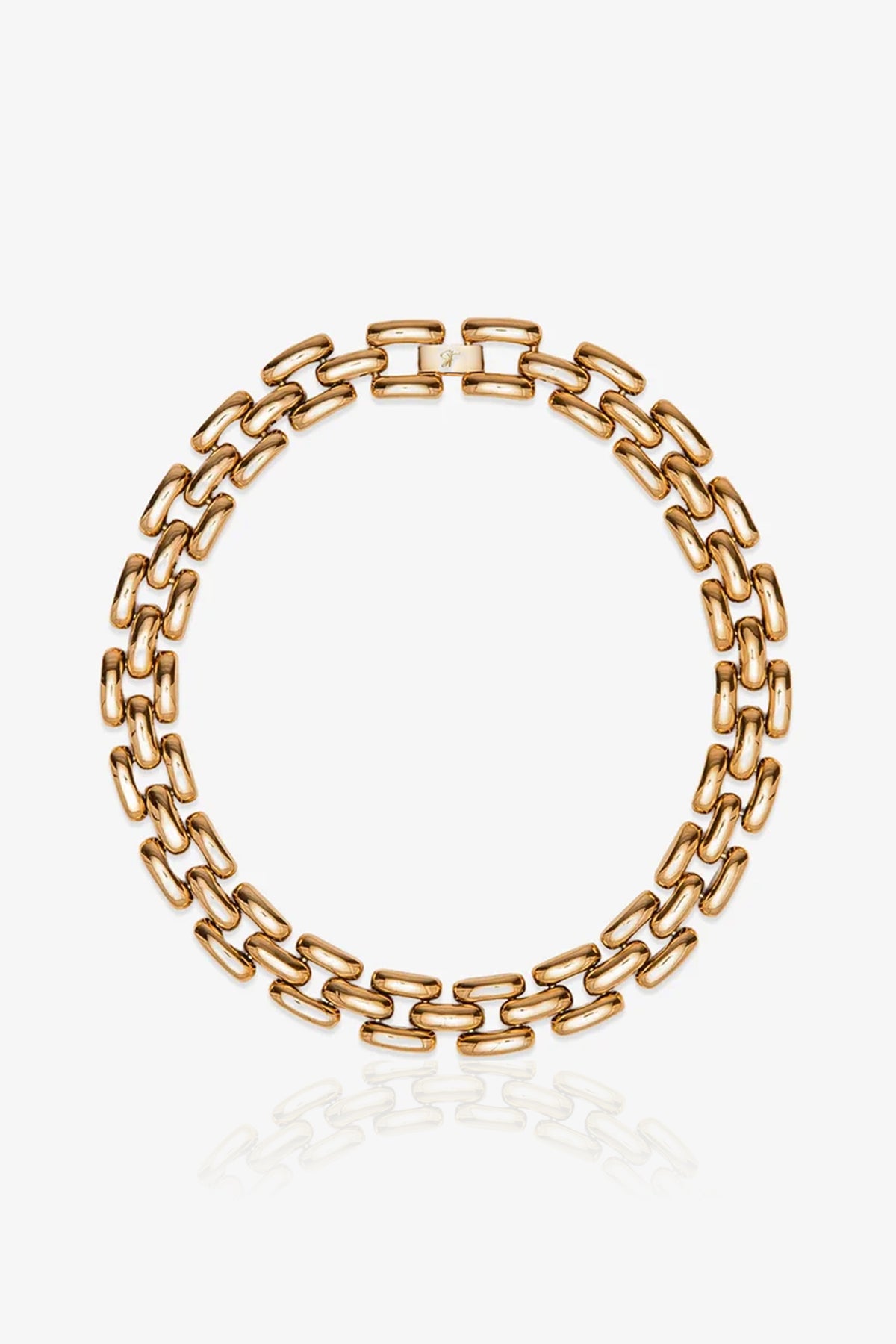 The Phoebe 17″ Necklace is a gold chain featuring large, rectangular links arranged in a circular shape and displayed on a white background.