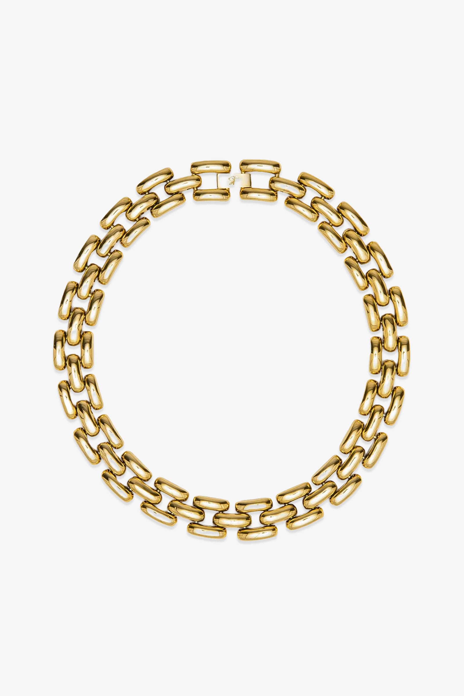 The Phoebe 17″ Necklace features two rows of interlocking rectangular gold links, arranged in a circular shape, displayed against a white background.