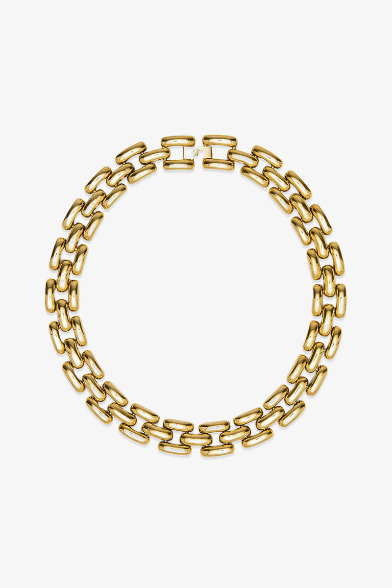 The Phoebe 17″ Necklace features two rows of interlocking rectangular gold links, arranged in a circular shape, displayed against a white background.