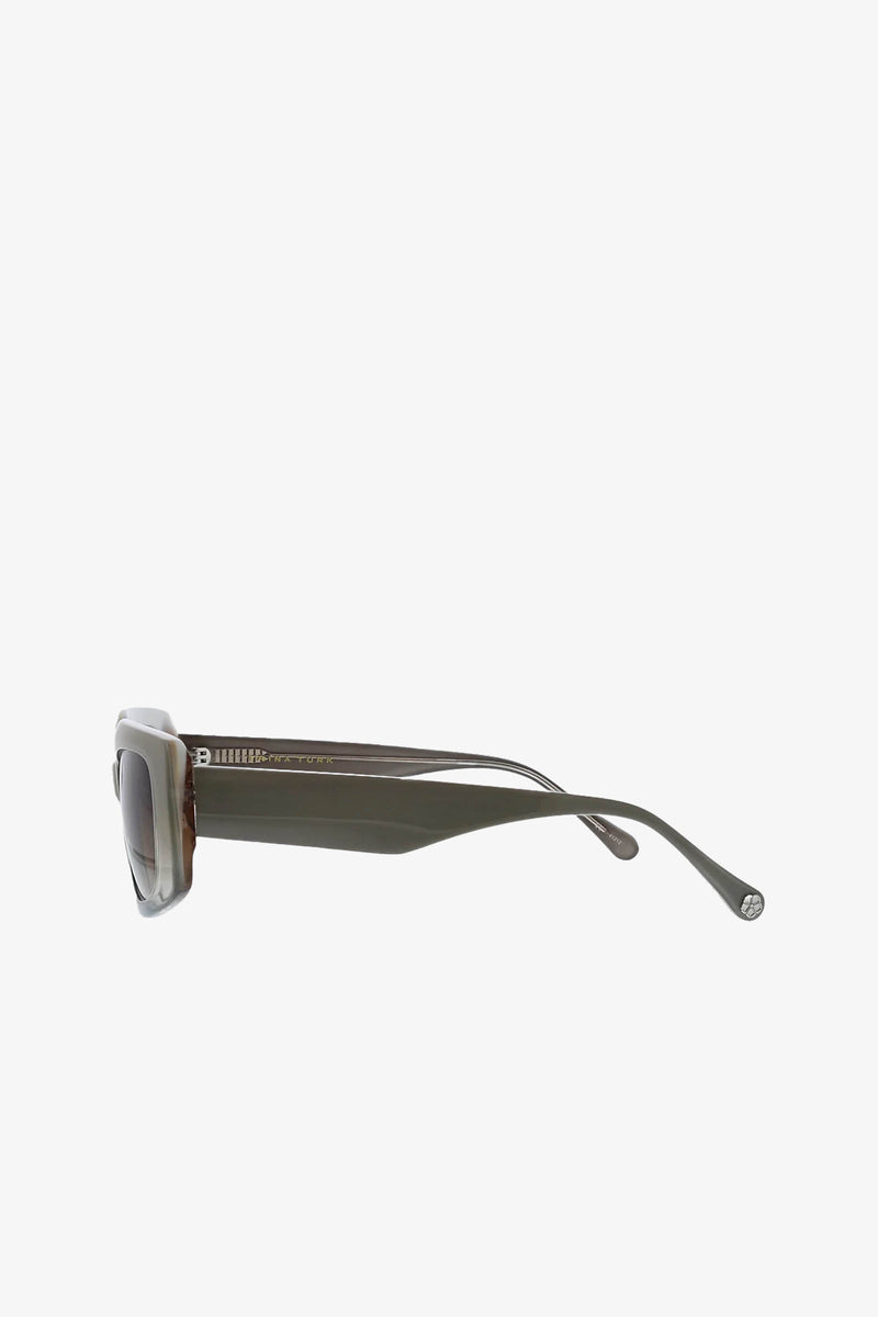 Side view of the Wasaga Rectangular Sunglasses, featuring dark lenses, thick frames, and matching straight arms, set against a plain white background.
