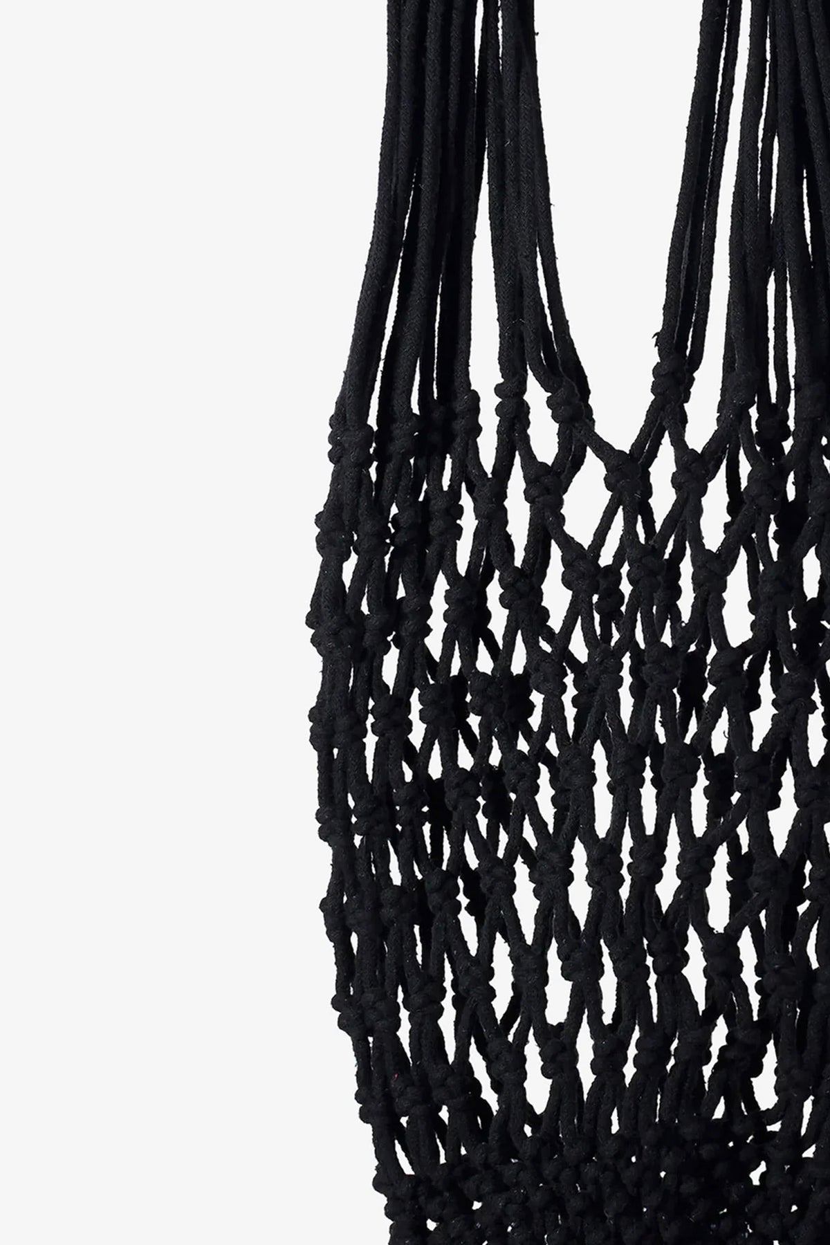 Close-up of the Nannacay Kim Woven Bag in black, featuring intricate knotted macramé cord patterns and loops against a white background.