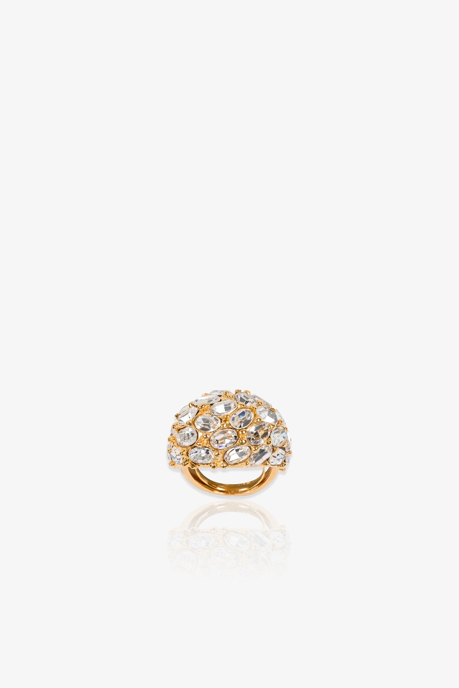 Cluster Stone Dome Ring featuring a rounded gold dome top encrusted with multiple sparkling clear stones, showcased on a white background with a subtle reflection below.
