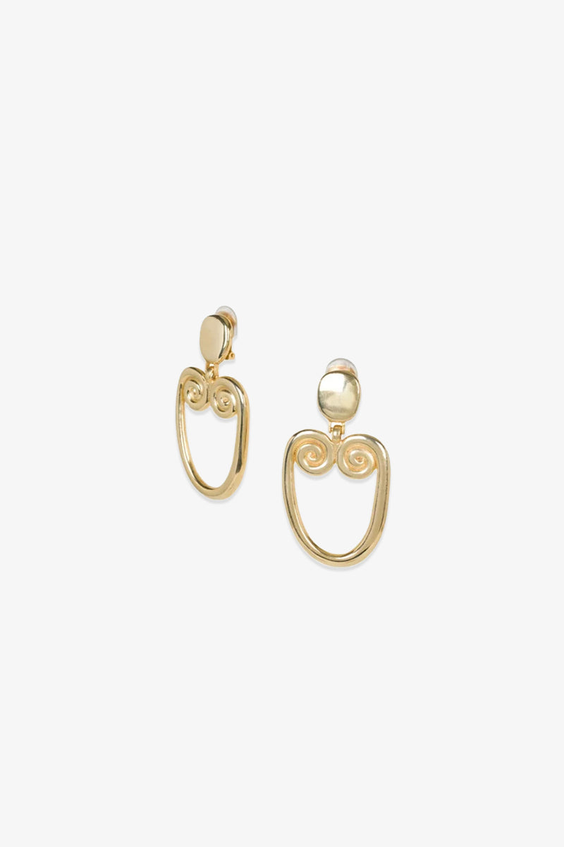 TT x KJL Gold Double Scroll Clip-On Earrings featuring circular studs and open oval-shaped dangles with intricate spiral designs, shown against a plain white background.