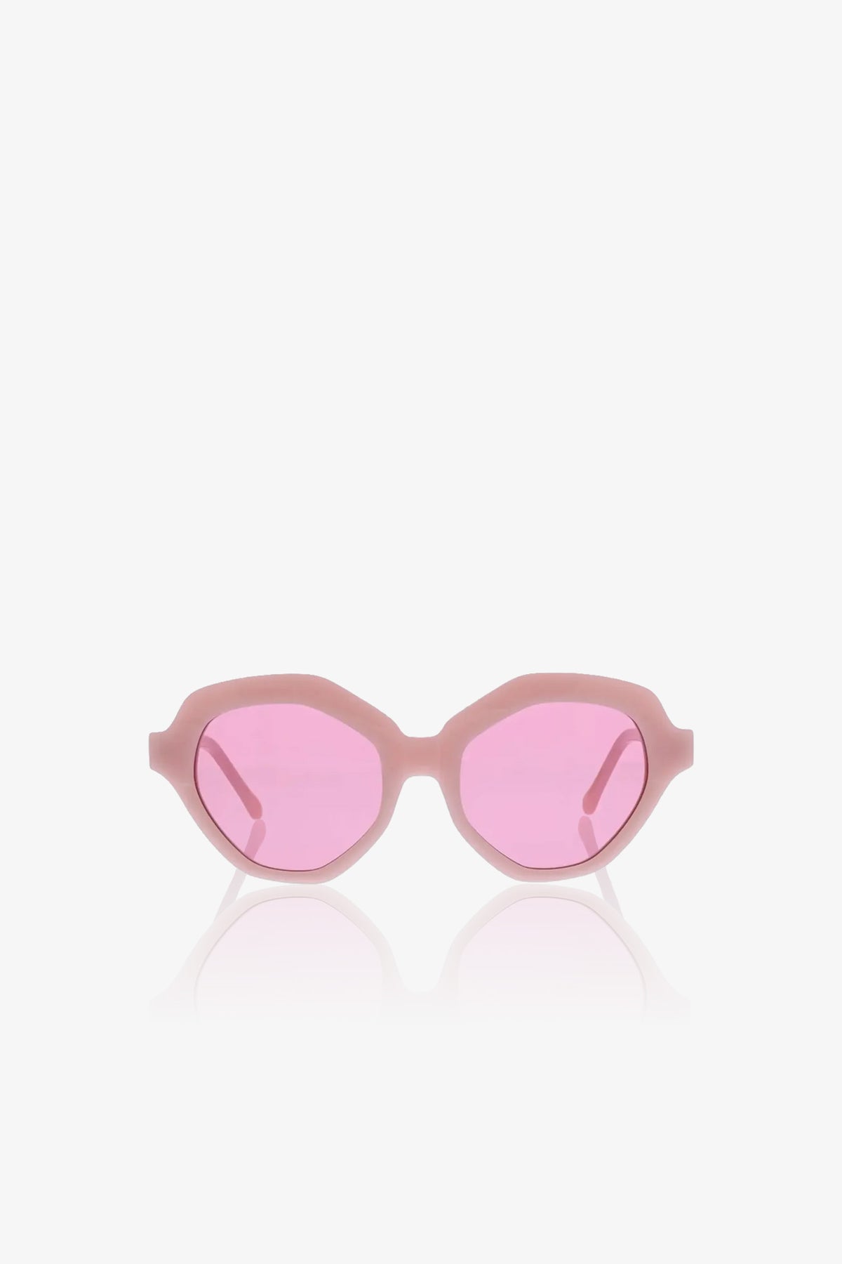The Ipanema Sunglasses feature a thick, light pink oval frame with pink-tinted lenses, displayed on a plain white background.