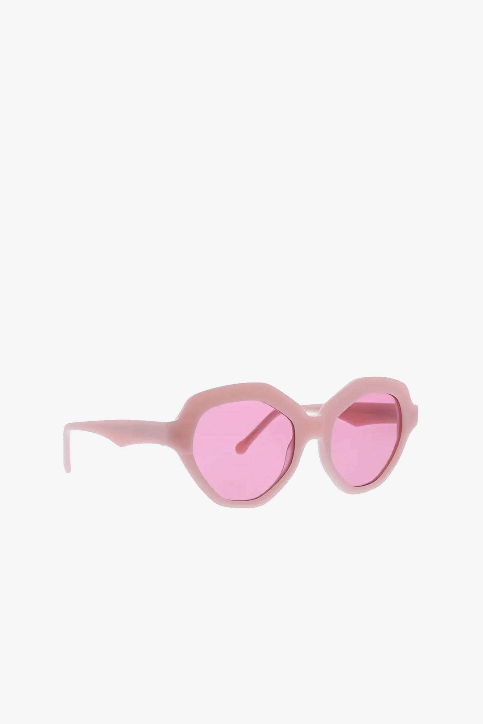 Ipanema Sunglasses featuring geometric pink frames and translucent pink lenses, displayed against a plain white background.