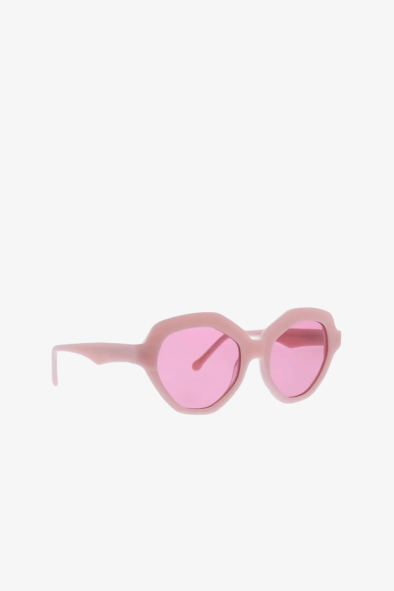 Ipanema Sunglasses featuring geometric pink frames and translucent pink lenses, displayed against a plain white background.