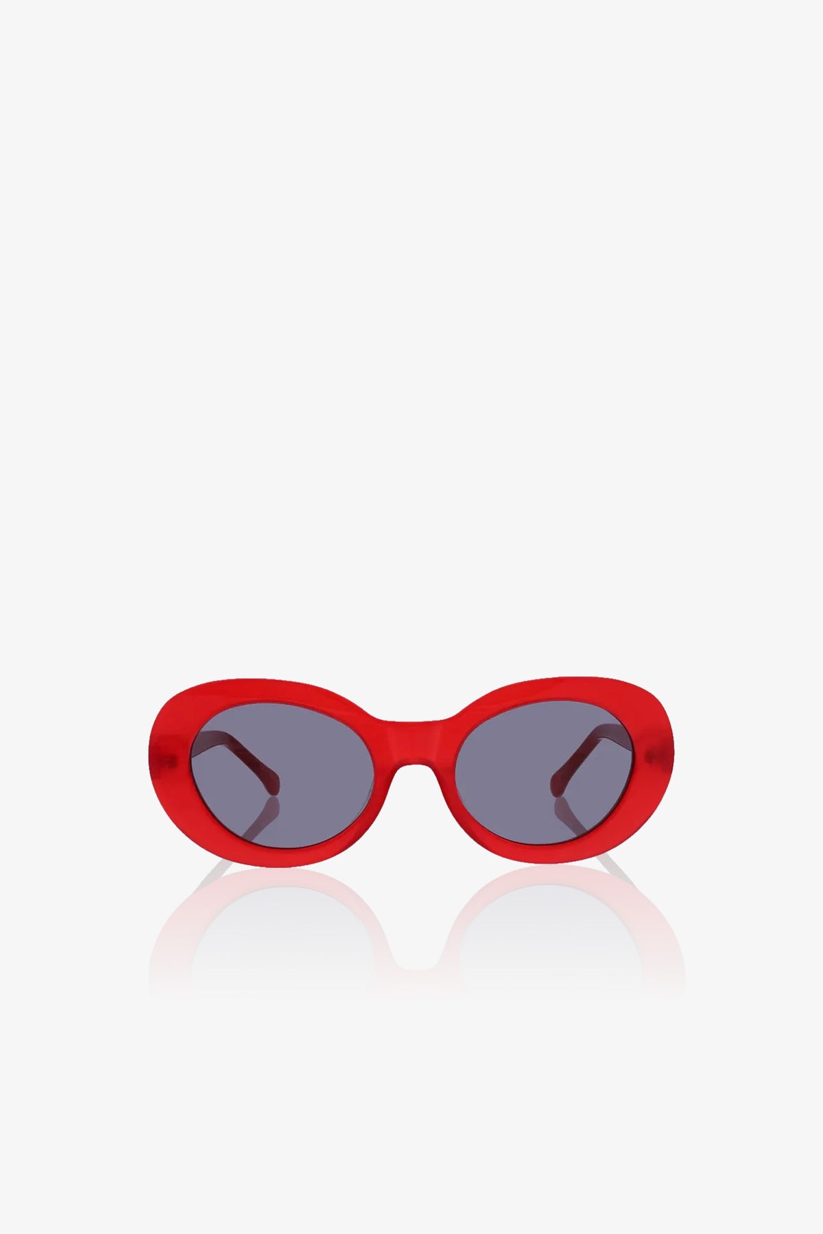 Carova Oval Sunglasses featuring a bold, glossy red frame and dark lenses are displayed on a white background. The distinctive oval design allows the arms of the glasses to be seen through the lenses.