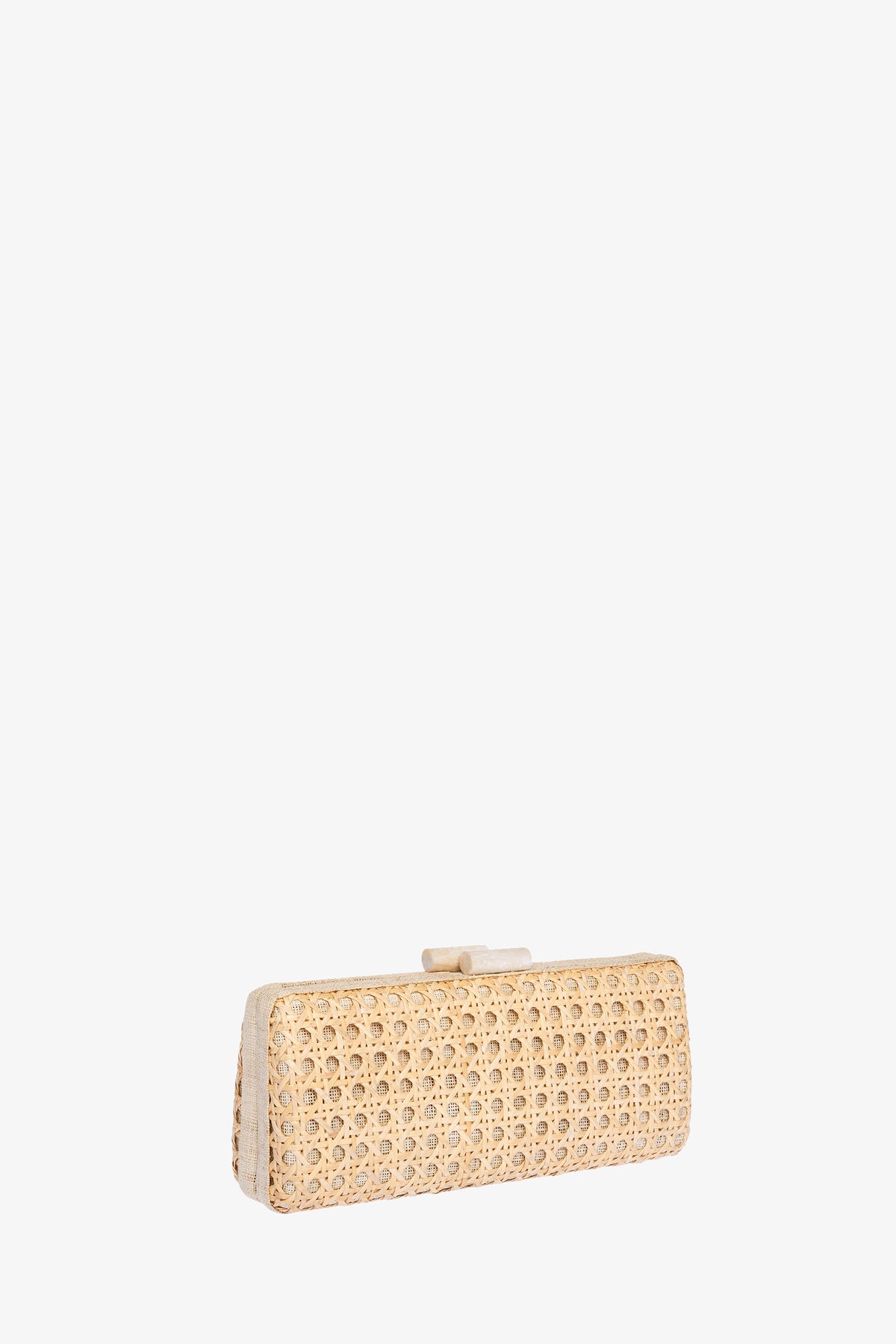 The Alessandra Rattan Long Clutch features a rectangular shape, light beige woven rattan texture, and a small top clasp, displayed on a plain white background.