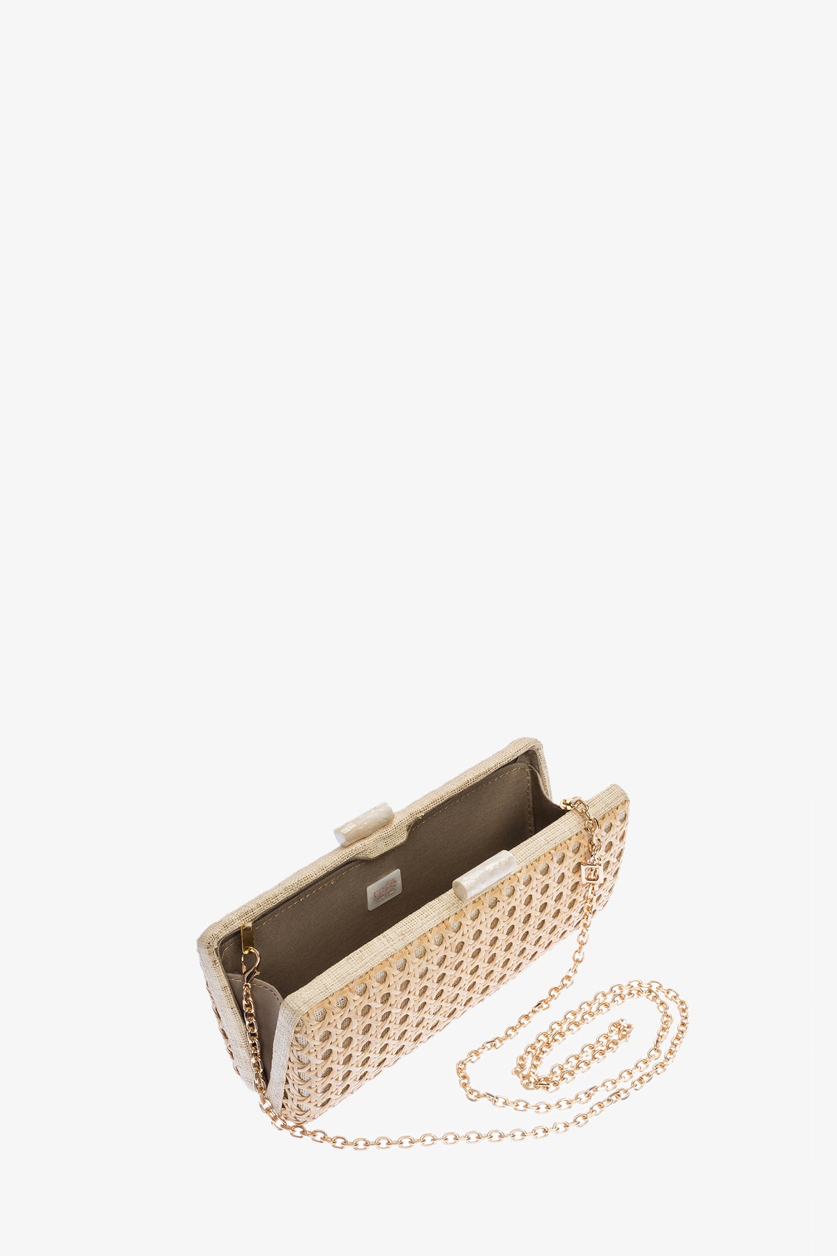 The Alessandra Rattan Long Clutch, a beige woven bag with a gold chain strap, is shown open to reveal its brown interior and rectangular shape against a white background.