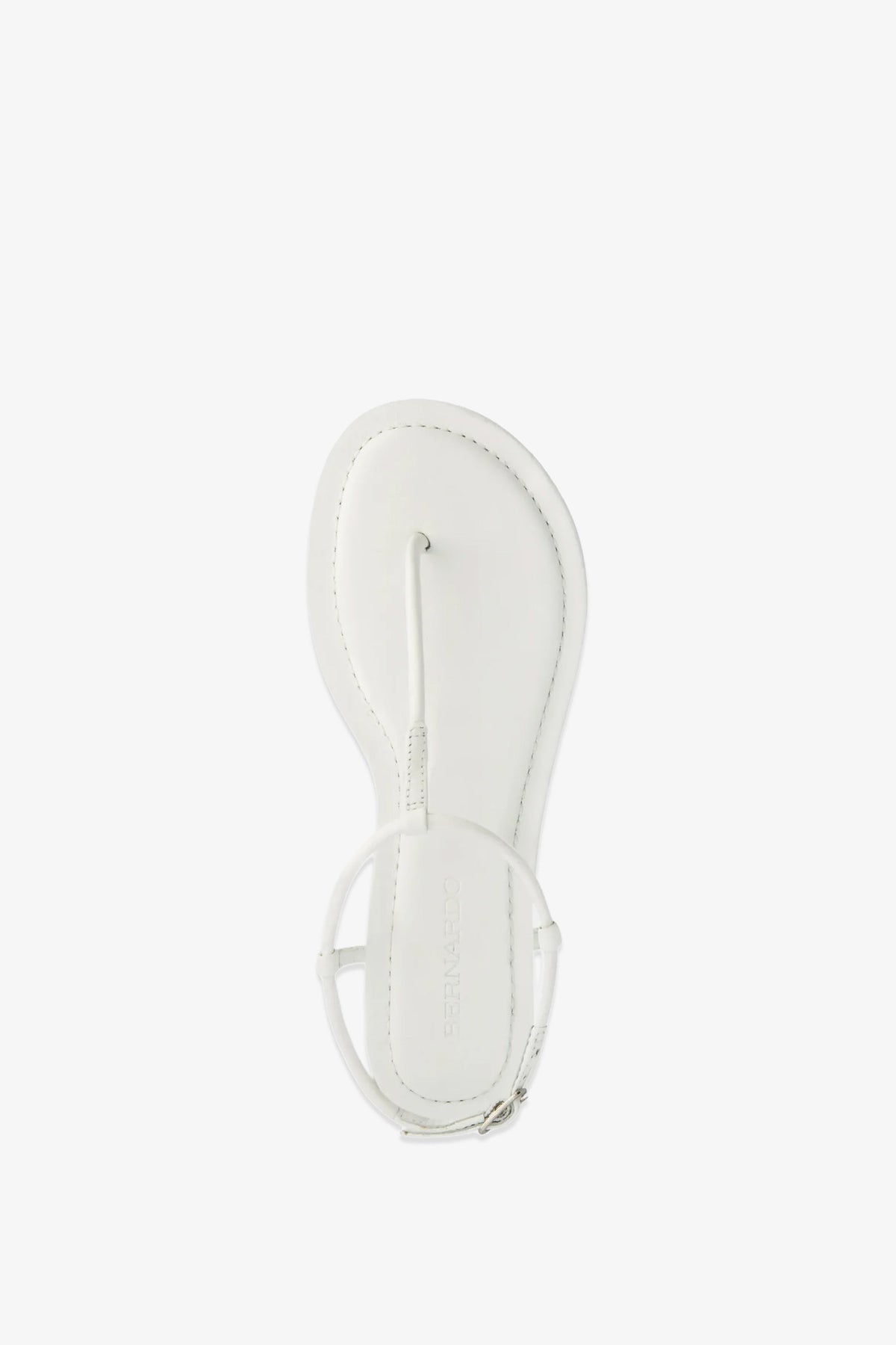 The Hercu Sandal is displayed from an overhead view, showcasing its minimalist white thong design with an ankle strap against a clean white background.