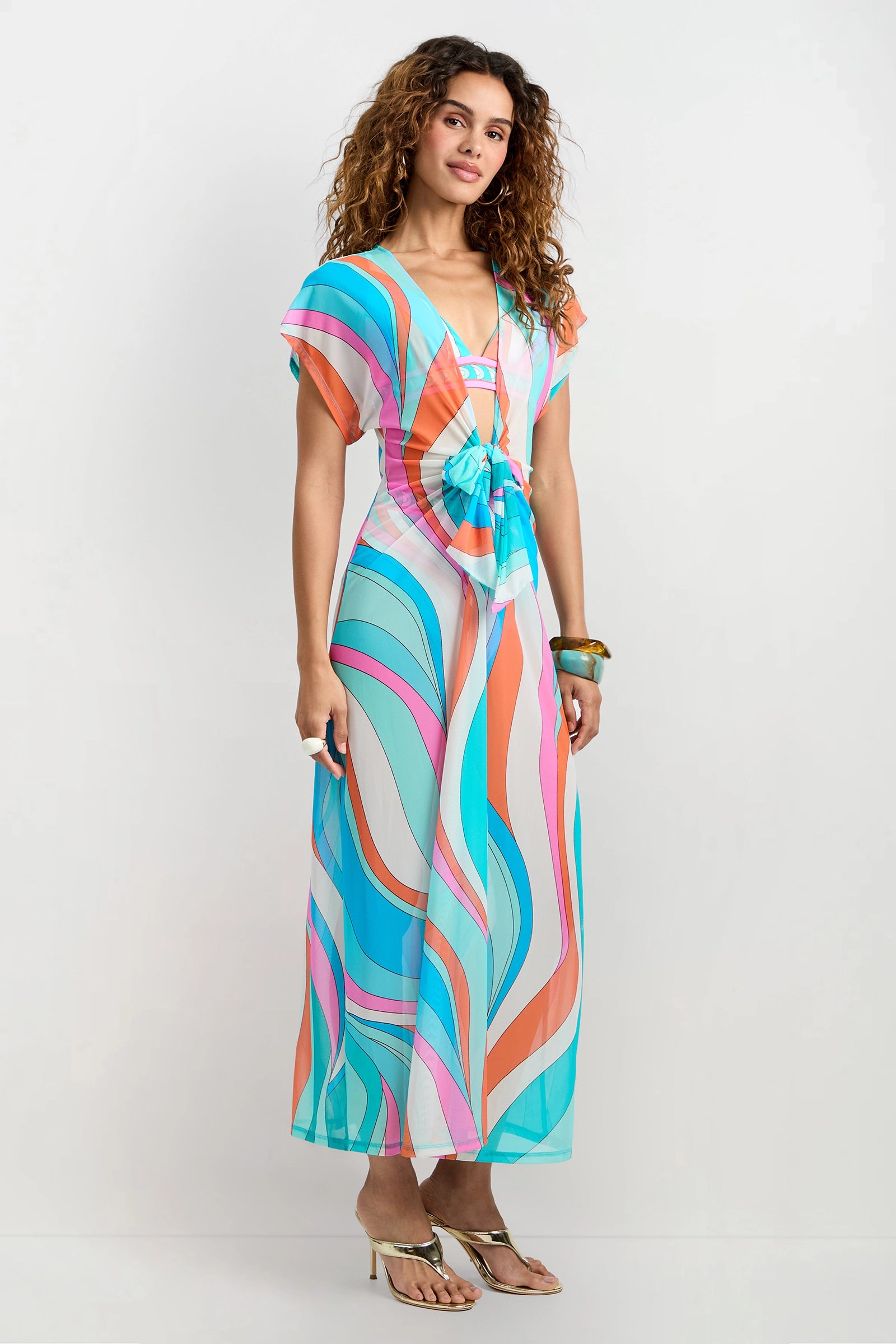 Of course! Please provide the keywords you'd like me to use, and I'll update the Cover-Up Maxi Dress - Apollo description accordingly.