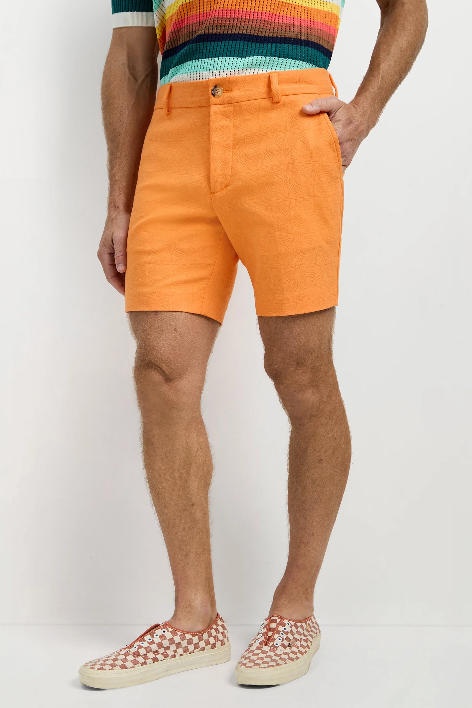 Wearing Travis Short - Tegola Jacquard, a person stands with one hand in their pocket against a plain white background.