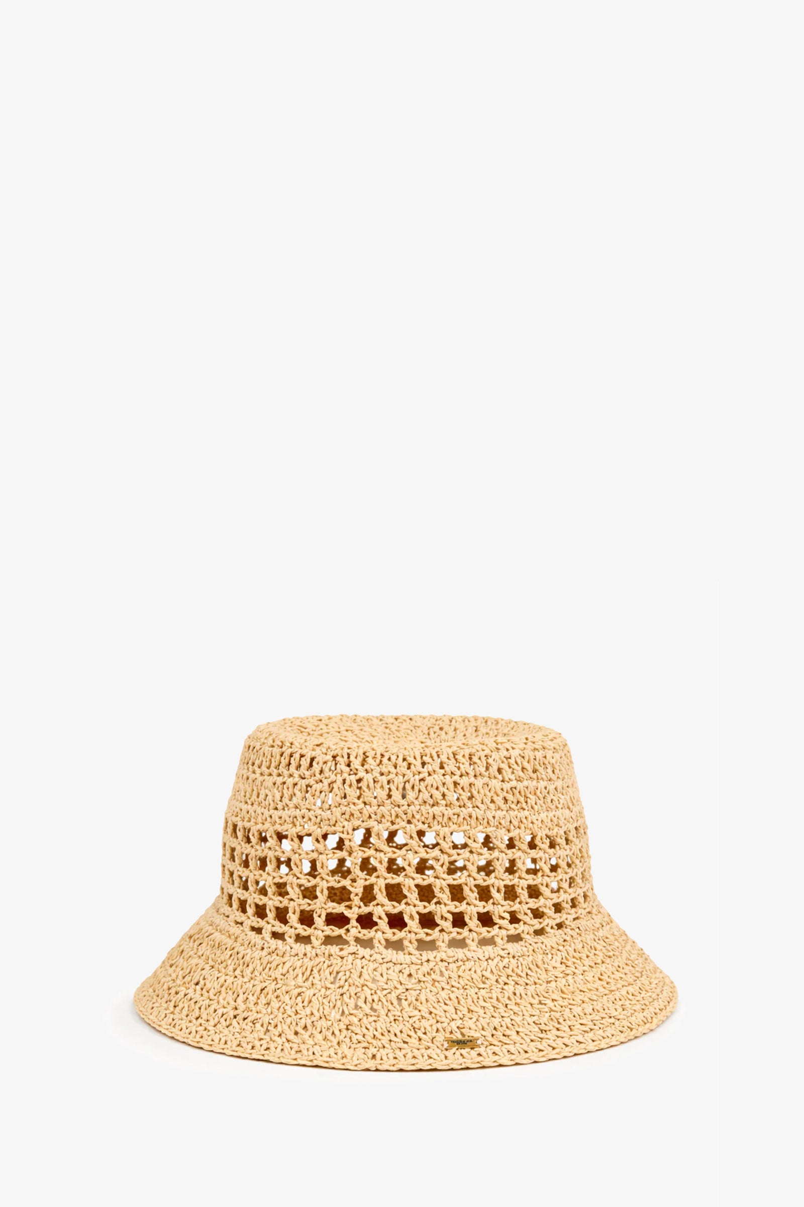 The Jonah Hat, in a natural hue, is a crochet bucket hat crafted from woven straw with a wide brim and openwork pattern around the crown, shown against a plain white background.