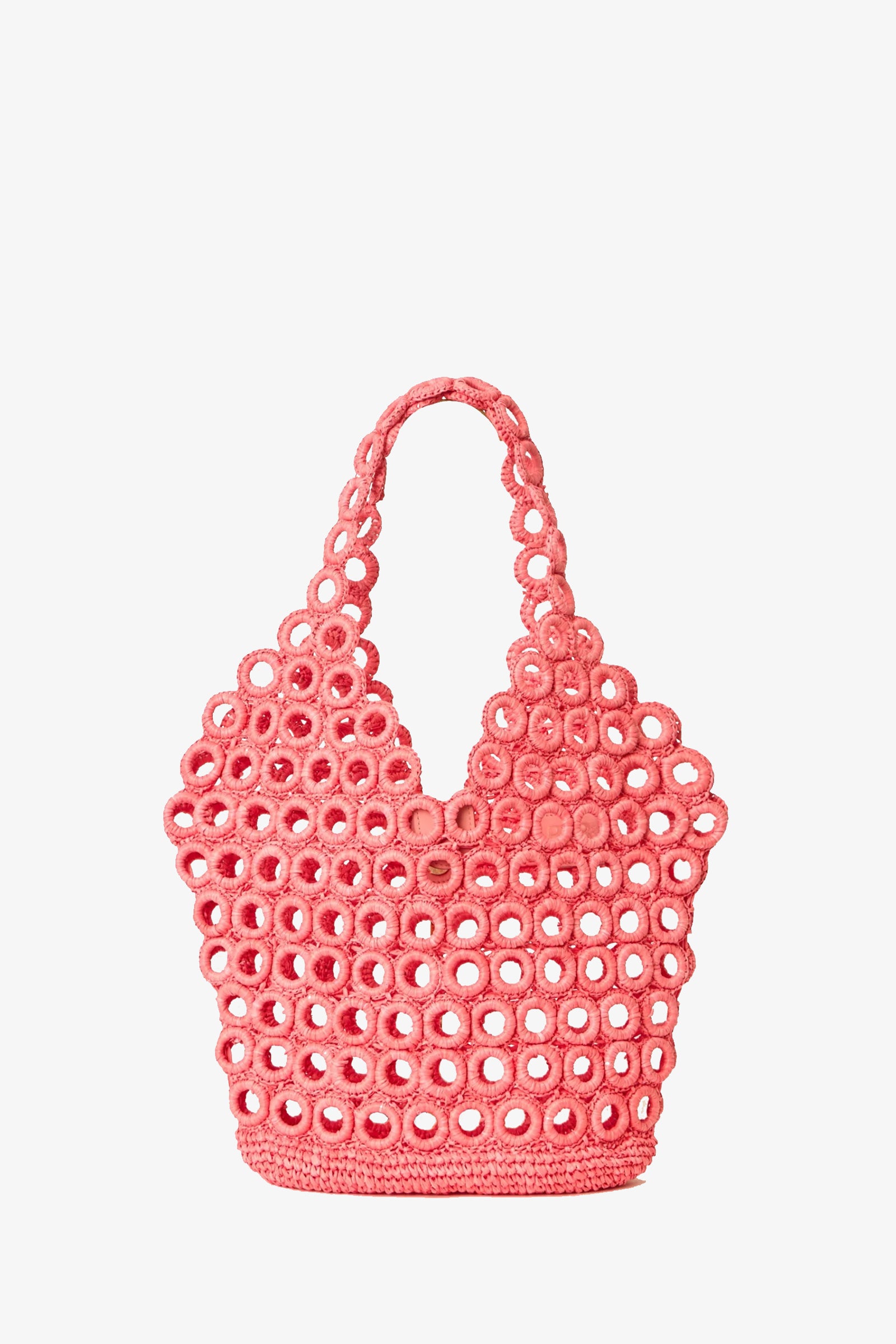 The Demi Large Tote is a fuchsia, open-weave handbag featuring a circular pattern and two matching handles, shown against a plain white background.