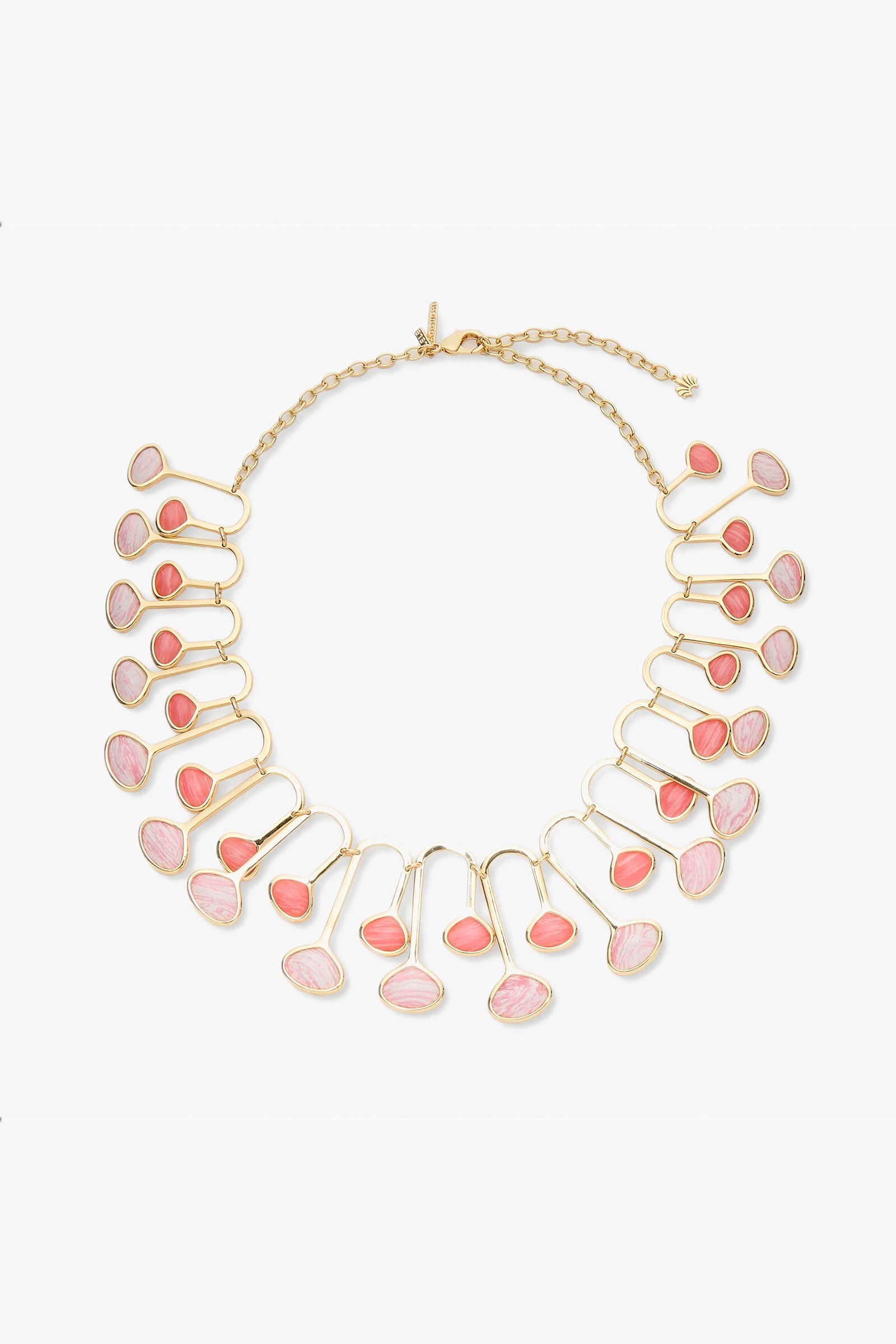 The Flamingo Necklace is a gold chain with coral teardrop stones and marbled accents in a fan design. It features an adjustable clasp.