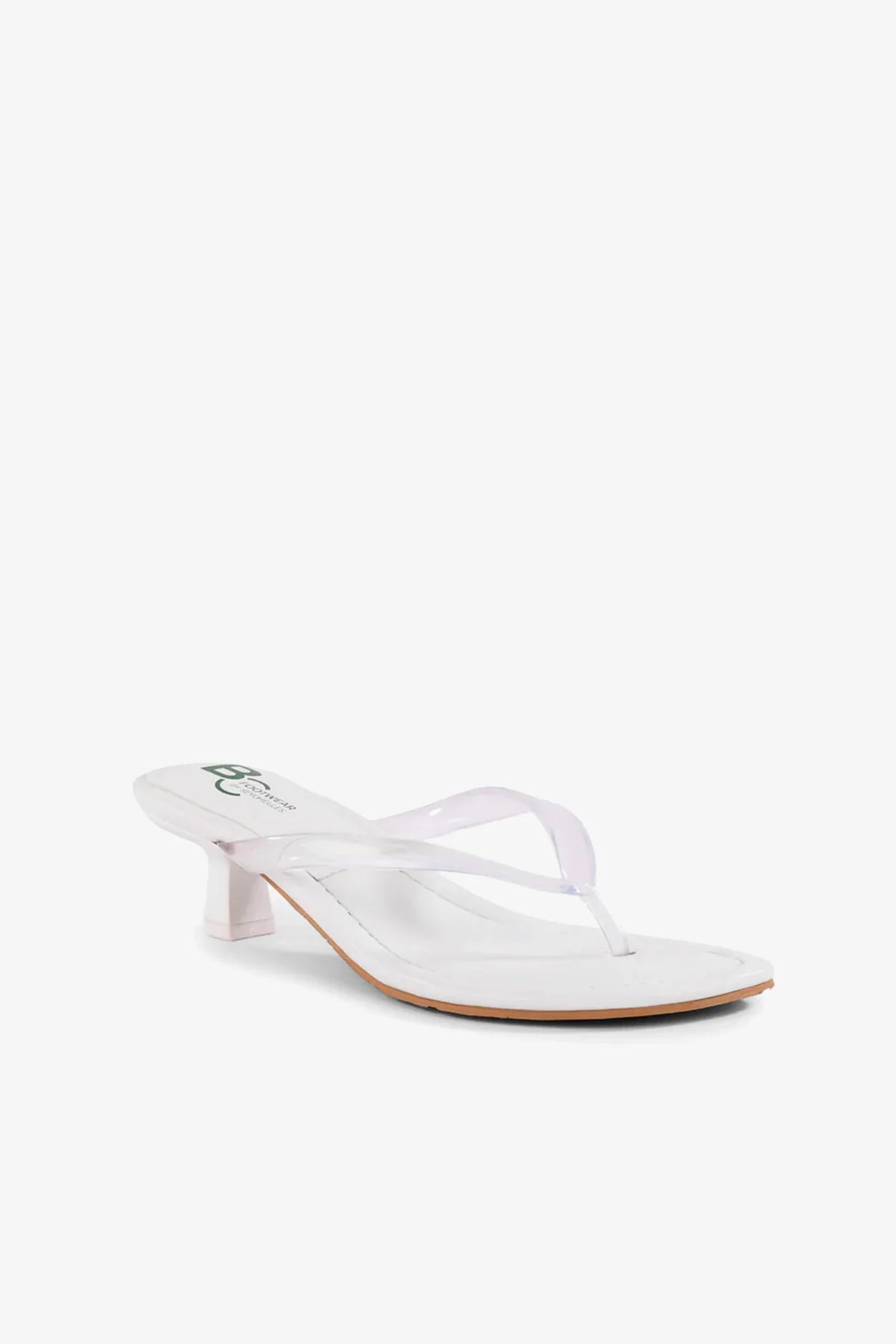 The Starbust Sandal is a white heeled sandal featuring a thong strap and a low heel, shown against a plain white background.