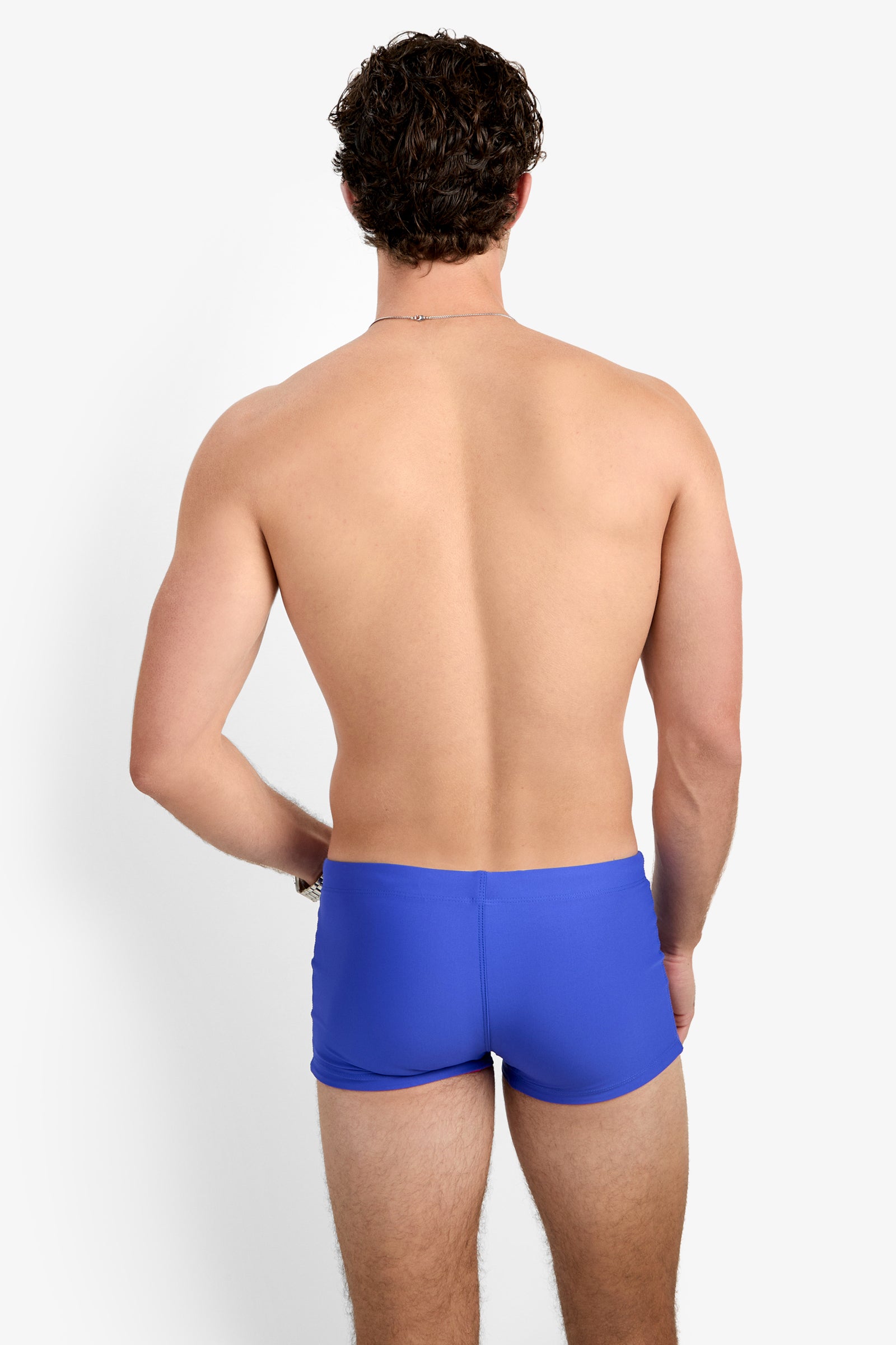 Of course! Please provide the keywords you'd like me to blend into the SEASIDE BCH SWIM TRUNK description.