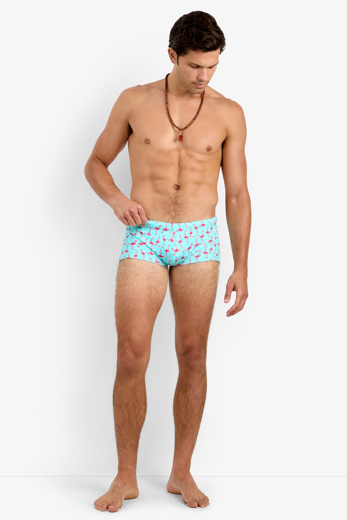 Of course! Please provide the keywords you'd like me to blend into the SORRENTO SWIM TRUNK description in Pink Flamingos.