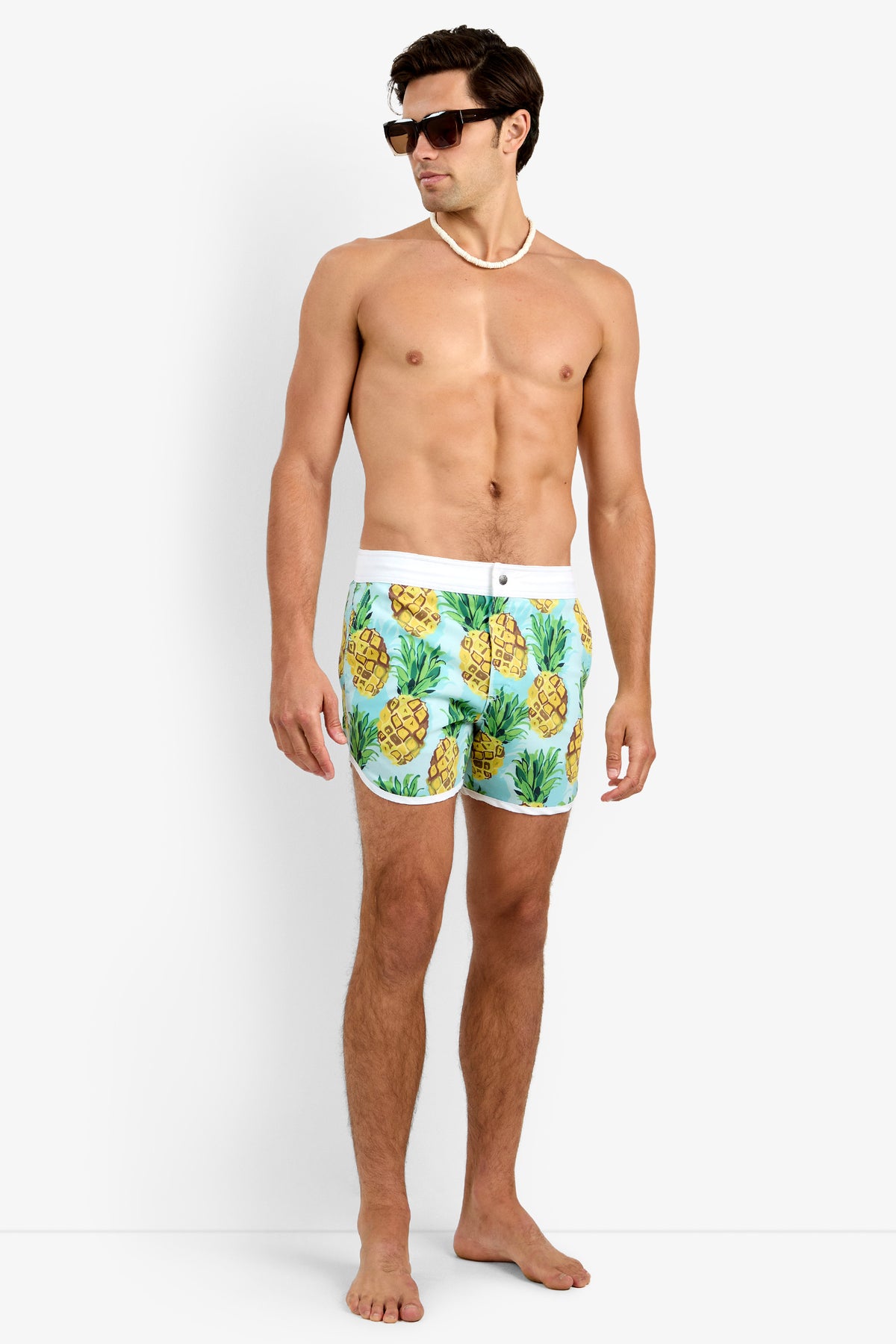 Of course! Please provide the keywords you'd like me to use for the SURFSIDE BOARD SHORT in Pineapples.