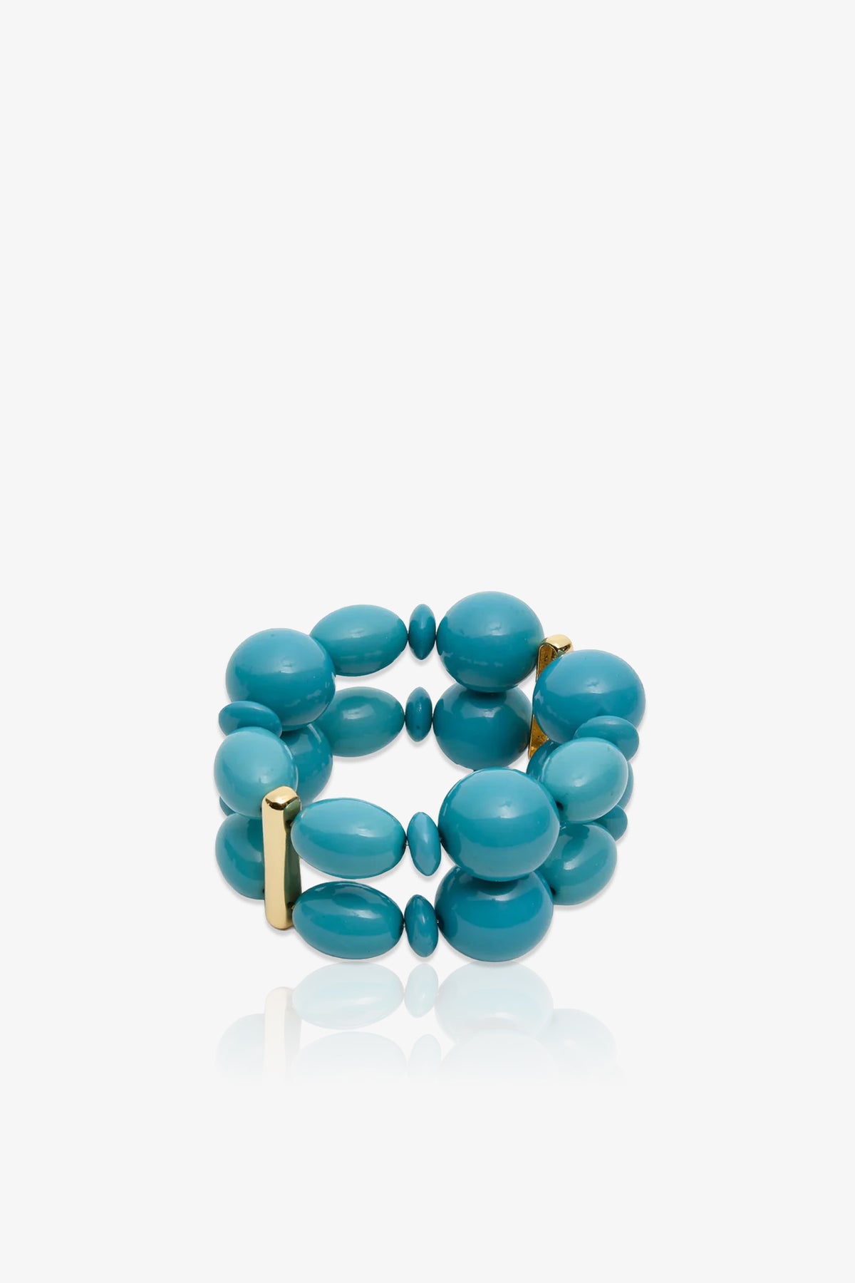 Introducing the Aventura Double Row Bracelette: a stretch bracelet featuring two rows of oval and round turquoise beads, accented by petite gold-tone bars. The bracelet is shown against a white background.