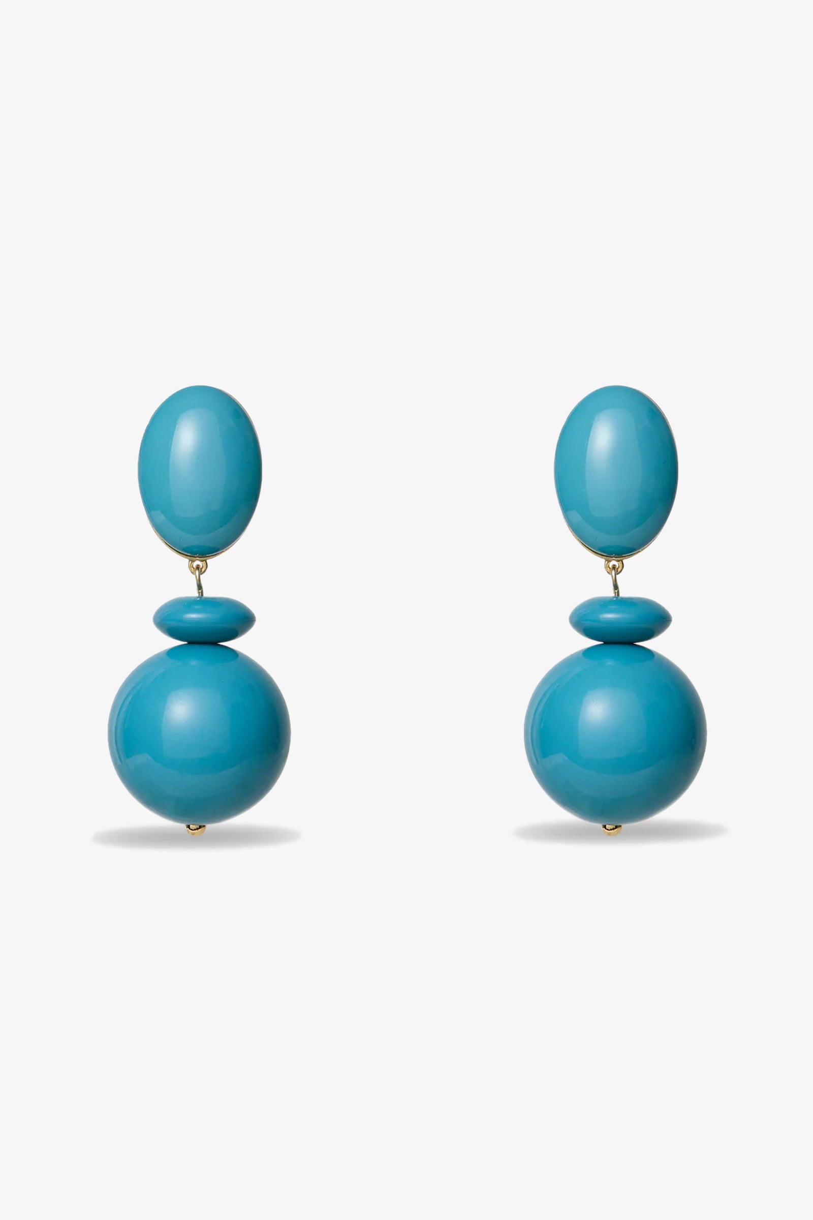 The Aventura Drop Earrings feature turquoise oval and spherical beads, shown on a white background.