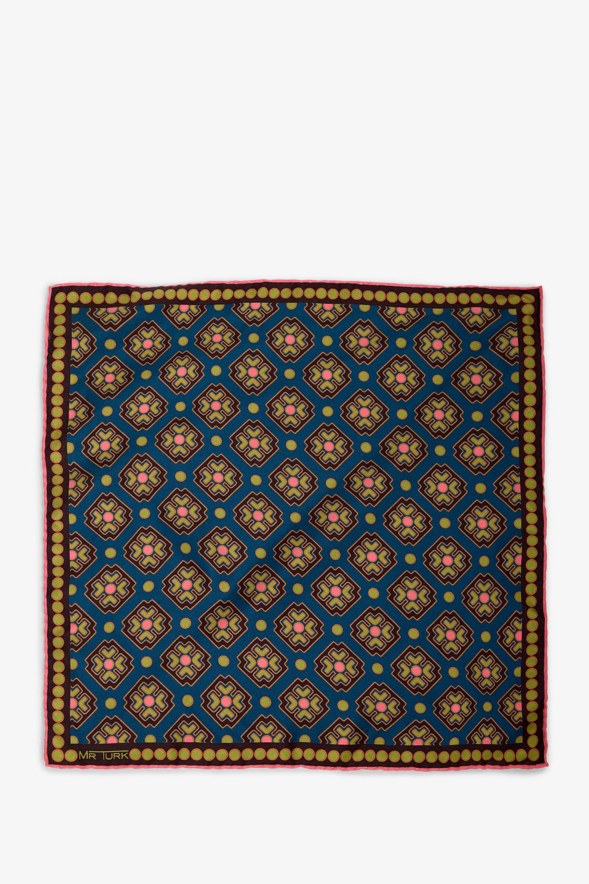 The Pocket Square features a geometric pattern of blue, yellow, red, and pink shapes on a square fabric, framed by a row of gold circles and finished with a thin red border.