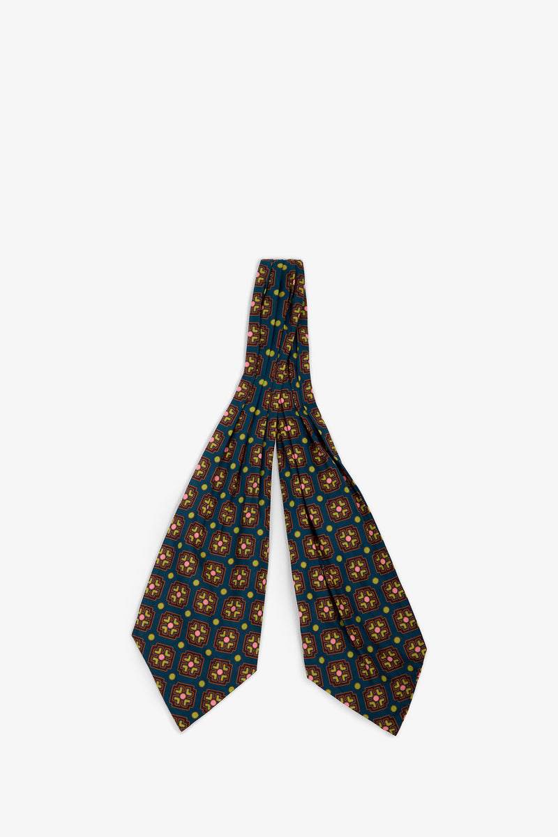 Ascot with a dark blue geometric pattern featuring pink and yellow squares and circles.