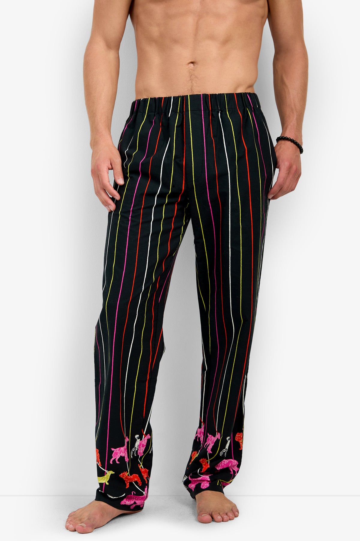 PJ PANT in 100% cotton, featuring colorful vertical stripes and a pattern of pink and yellow jaguars near the hems.