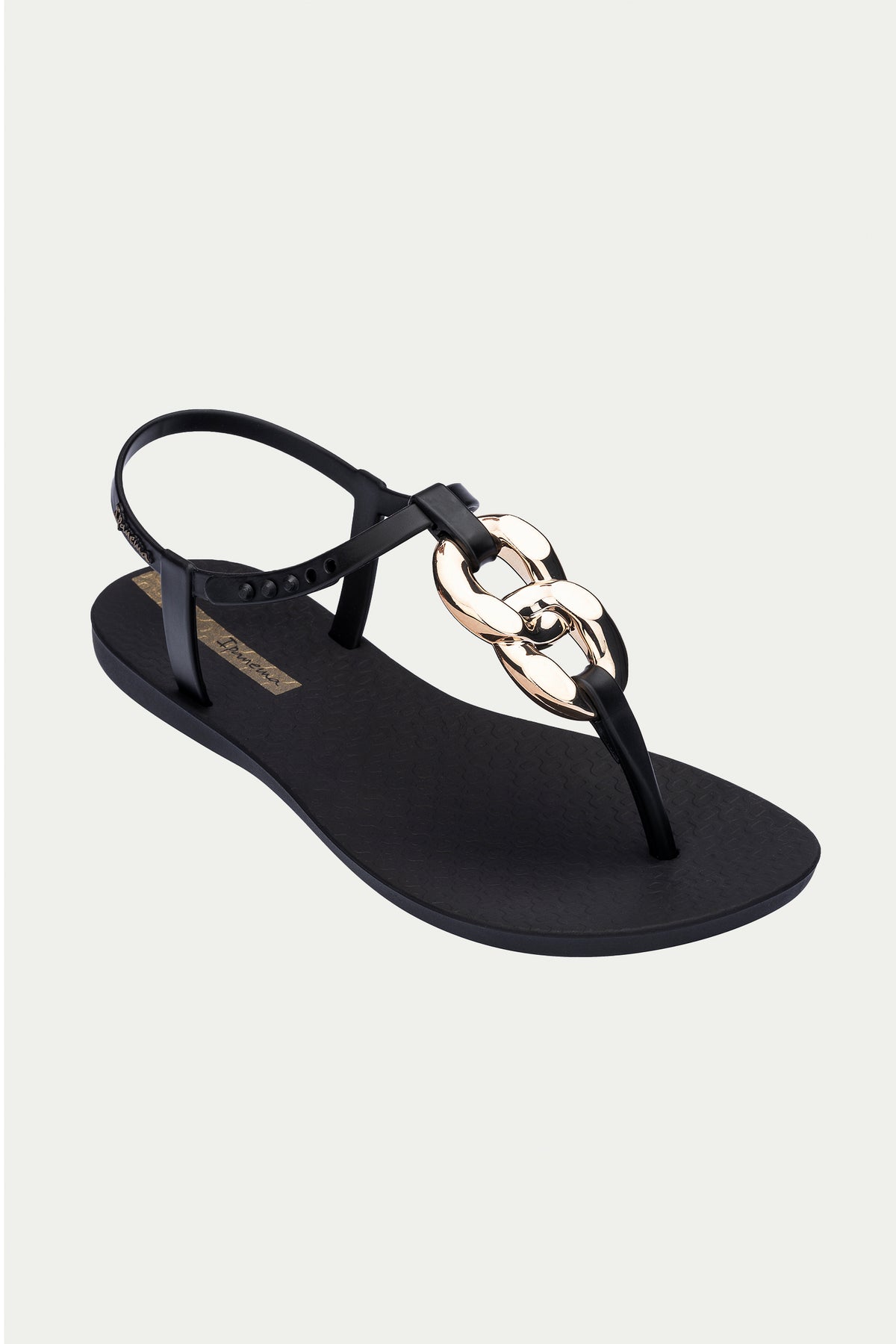 The Ipanema Class Connect Sandal in black features a textured sole, adjustable ankle strap, and gold chain-link detail on the upper strap, shown against a plain white background.