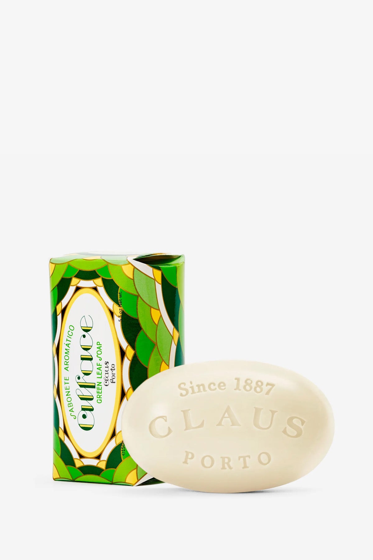 Oval bar of Claus Porto Alface Soap, embossed with “Claus Porto Since 1887,” displayed in front of a green, yellow, and white patterned box labeled “Aromatic Chypre,” both set against a white background.