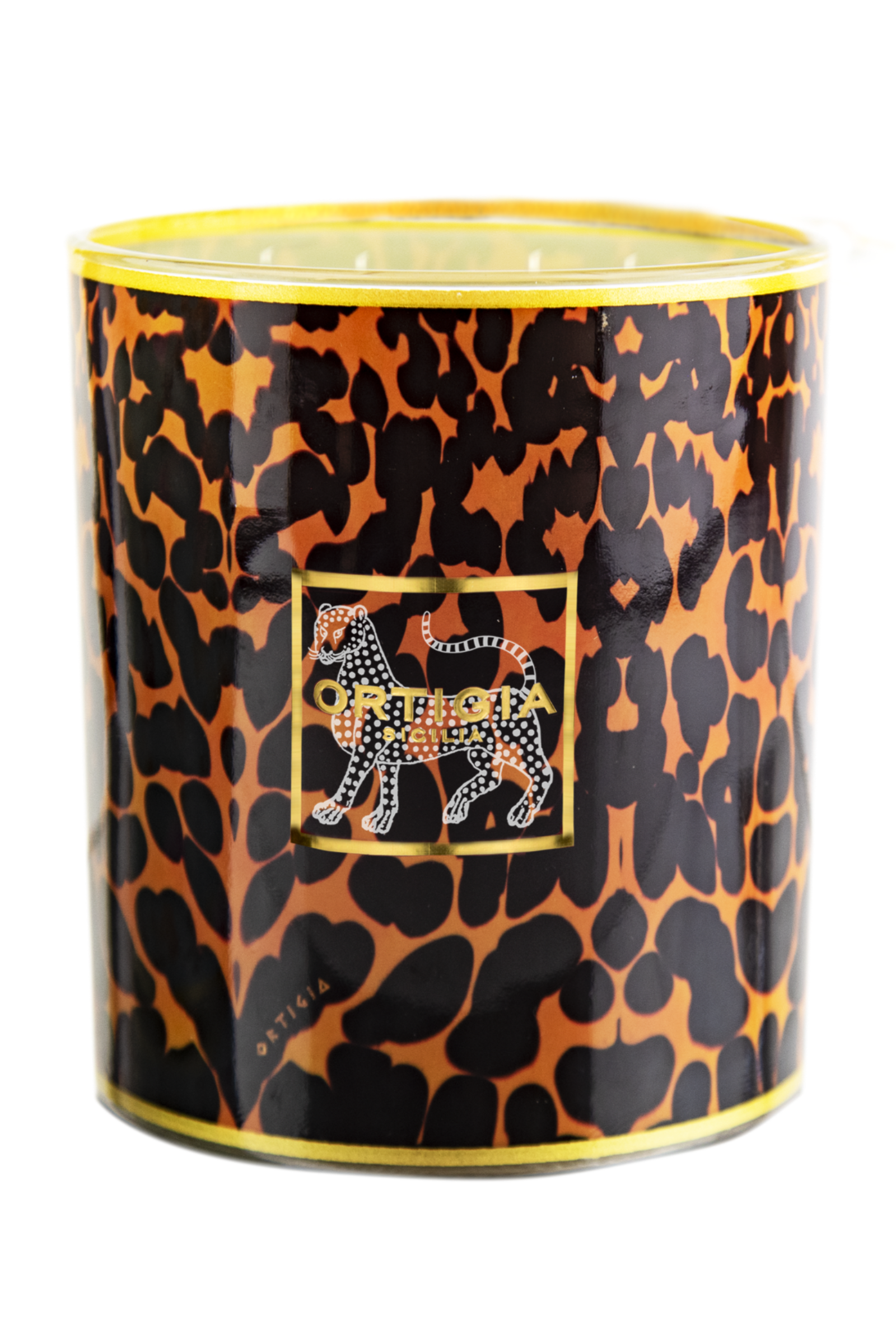 The ORTIGIA AMBRA NERA LG CANDLE comes in a glass container with a bold leopard print, finished with a square label featuring an illustrated leopard and the “Ortigia” text on the front.