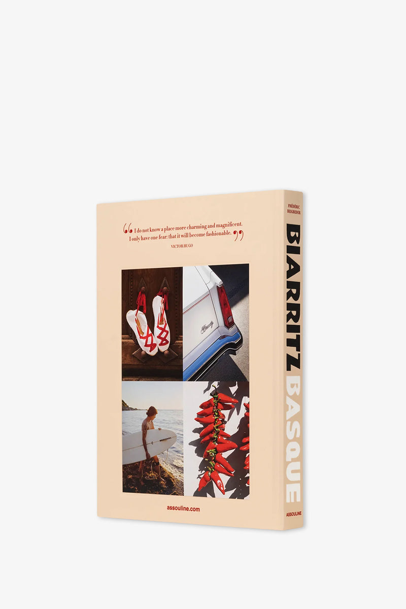 Assouline Biarritz Basque Book with a beige cover, featuring photos of red sandals, a car, a woman with a surfboard, and peppers on the back, plus a quote about the Basque region.
