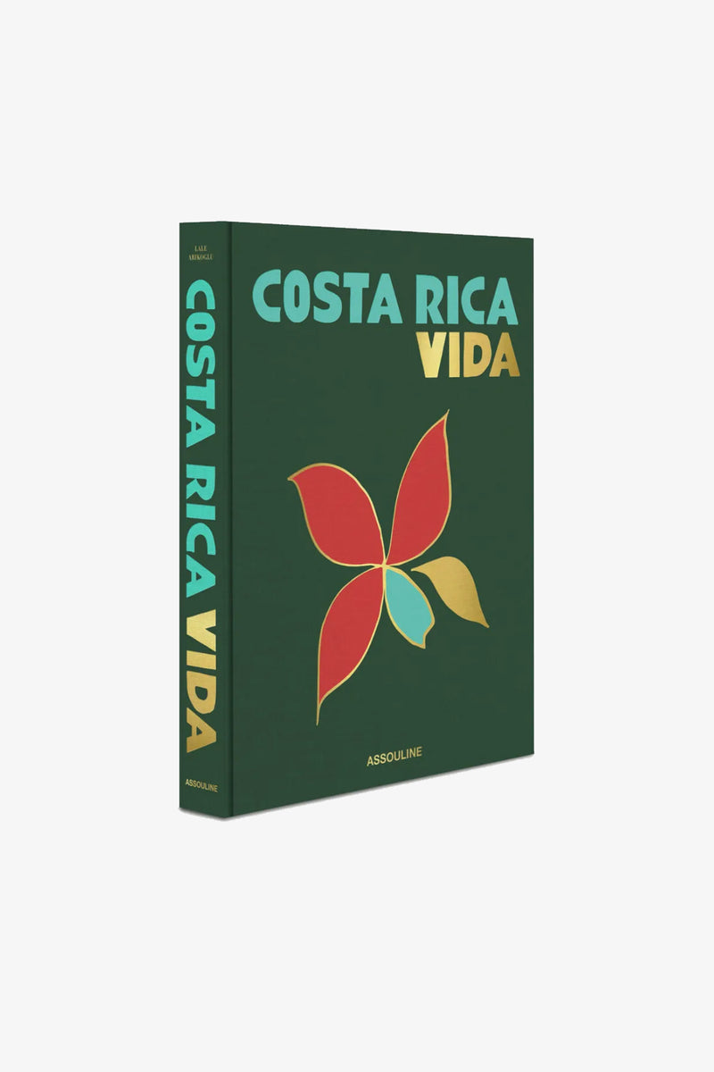 A green Assouline Costa Rica Vida Book featuring bold yellow and turquoise text and a vibrant, abstract flower design on the cover.