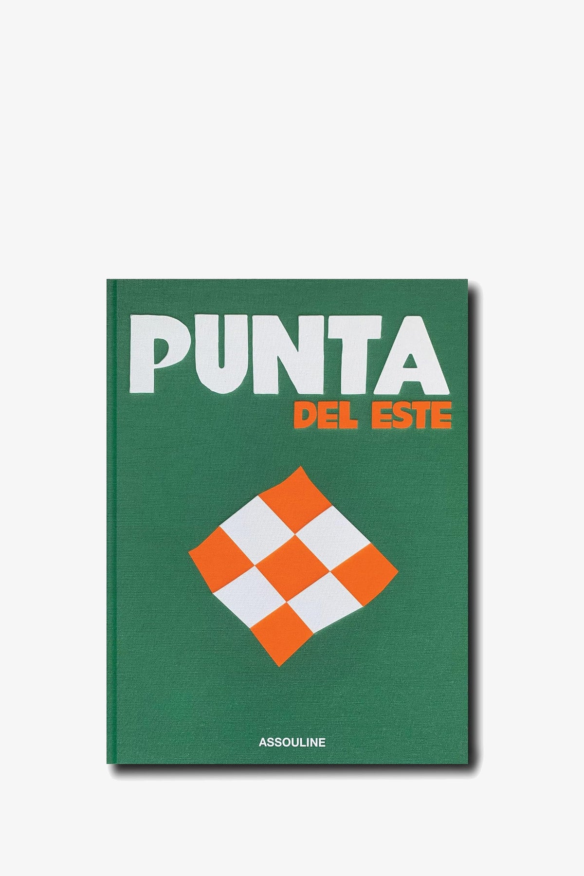 A green book cover featuring the Assouline Punta Del Este Book title in bold white and orange letters, accented by a white and orange checkered diamond design, with “Assouline” displayed at the bottom.