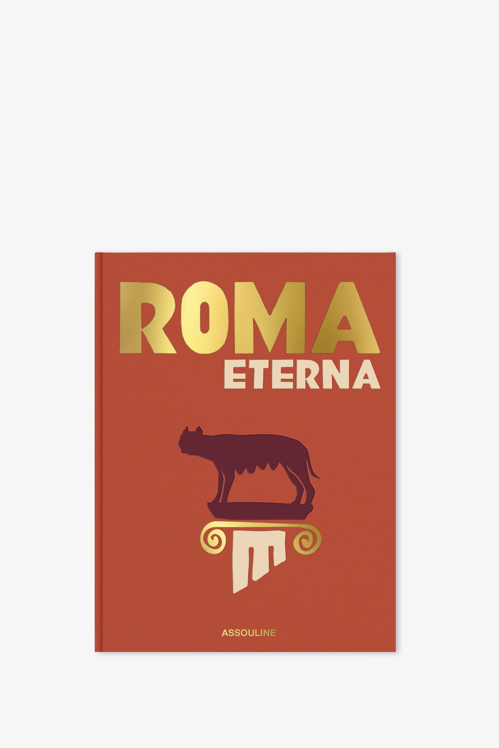 The Assouline Roma Eterna Book features a red cover with "ROMA ETERNA" in gold and white lettering, showcasing a silhouette of a she-wolf standing atop a classical column.