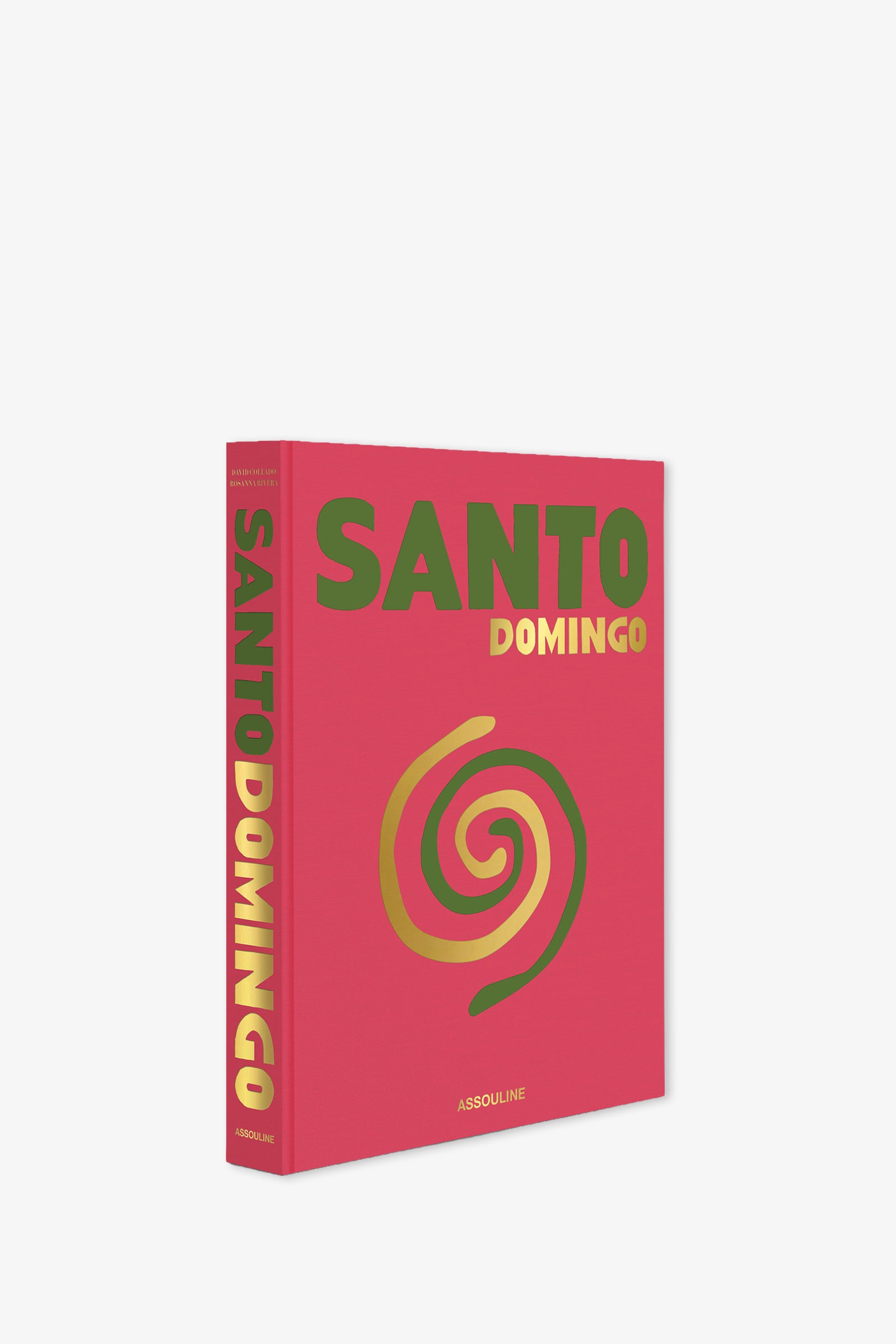 The Assouline Santo Domingo Book features a red cover with gold and green lettering and a yellow spiral design. It is displayed standing upright against a white background.