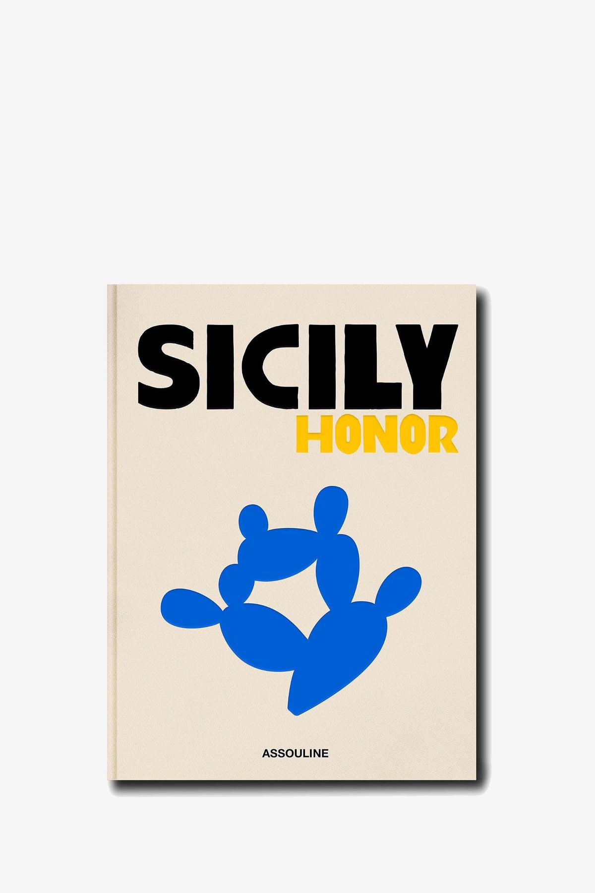 The Assouline Sicily Honor book features a cream cover with “SICILY” in bold black letters and “HONOR” in yellow above a blue prickly pear cactus illustration, with the publisher ASSOULINE at the bottom.