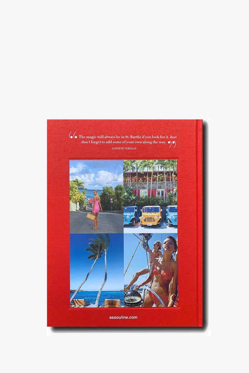 The Assouline St Barths Freedom Book features a vibrant red cover with a quote at the top and six lively photos capturing palm trees, vintage cars, sea views, luxury hotels, and a woman in a pink dress and sunglasses enjoying her tropical getaway.