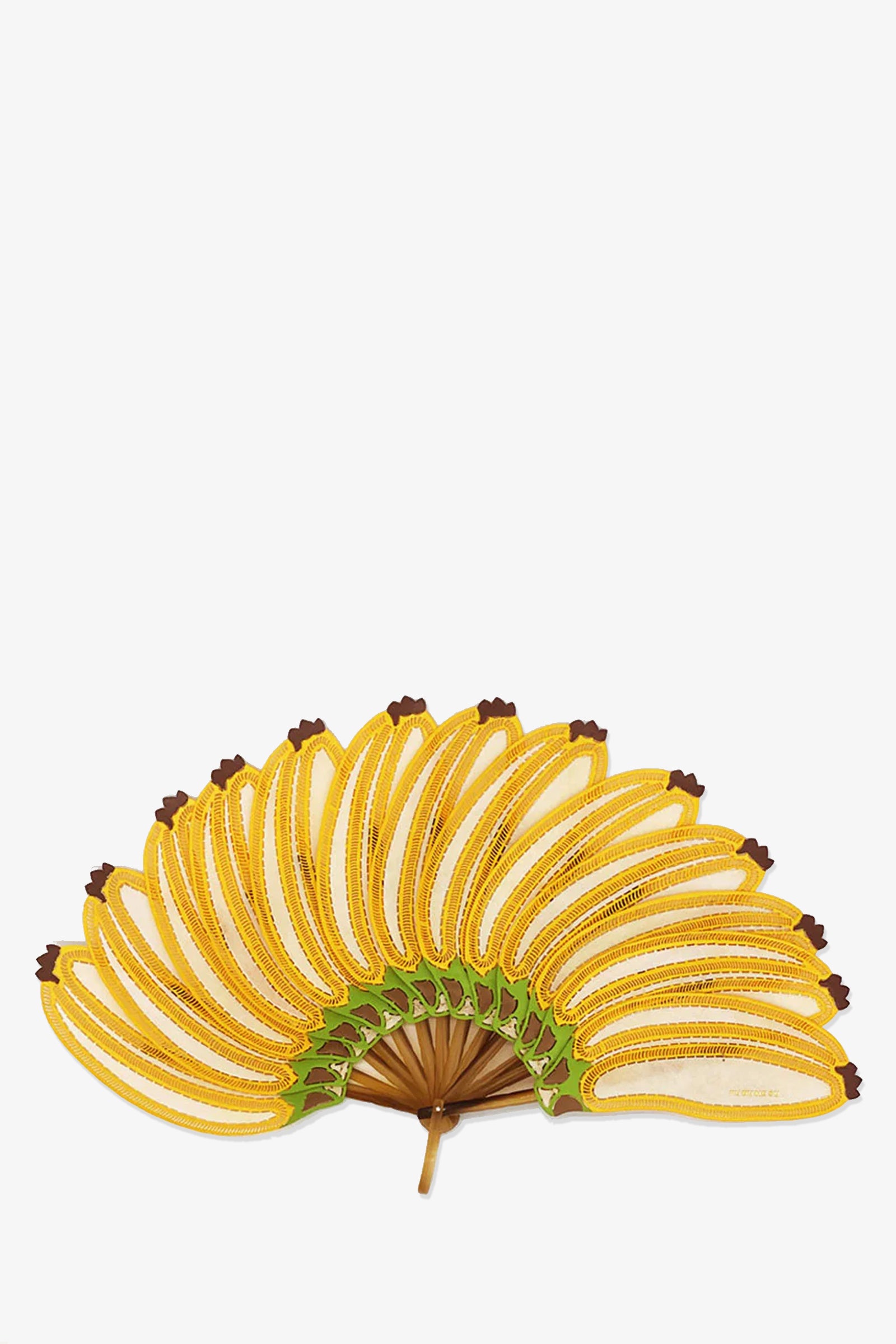 The Pu Bu Me Su Pisang Banana Fan is a handheld fan shaped like yellow bananas with green and brown accents, arranged semicircularly on a wooden handle, pictured against a white background.