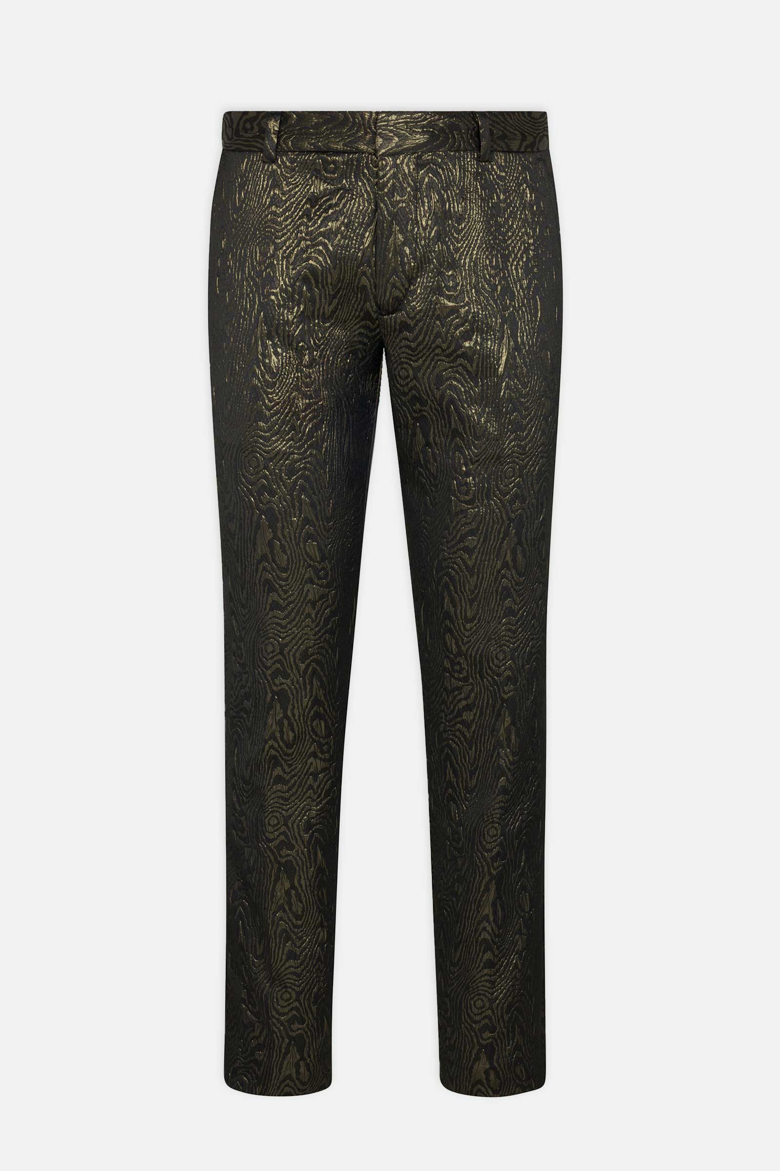 The Clyde Slim Trouser - Fette Swirl features metallic gold and black fabric with a shiny, wood grain-inspired textured pattern, shown against a white background.