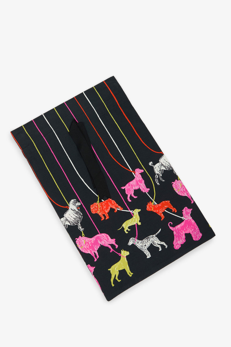 POOCH PAJAMA GIFT BAG: A black gift bag with a pattern of colorful dogs on leashes and vertical stripes.