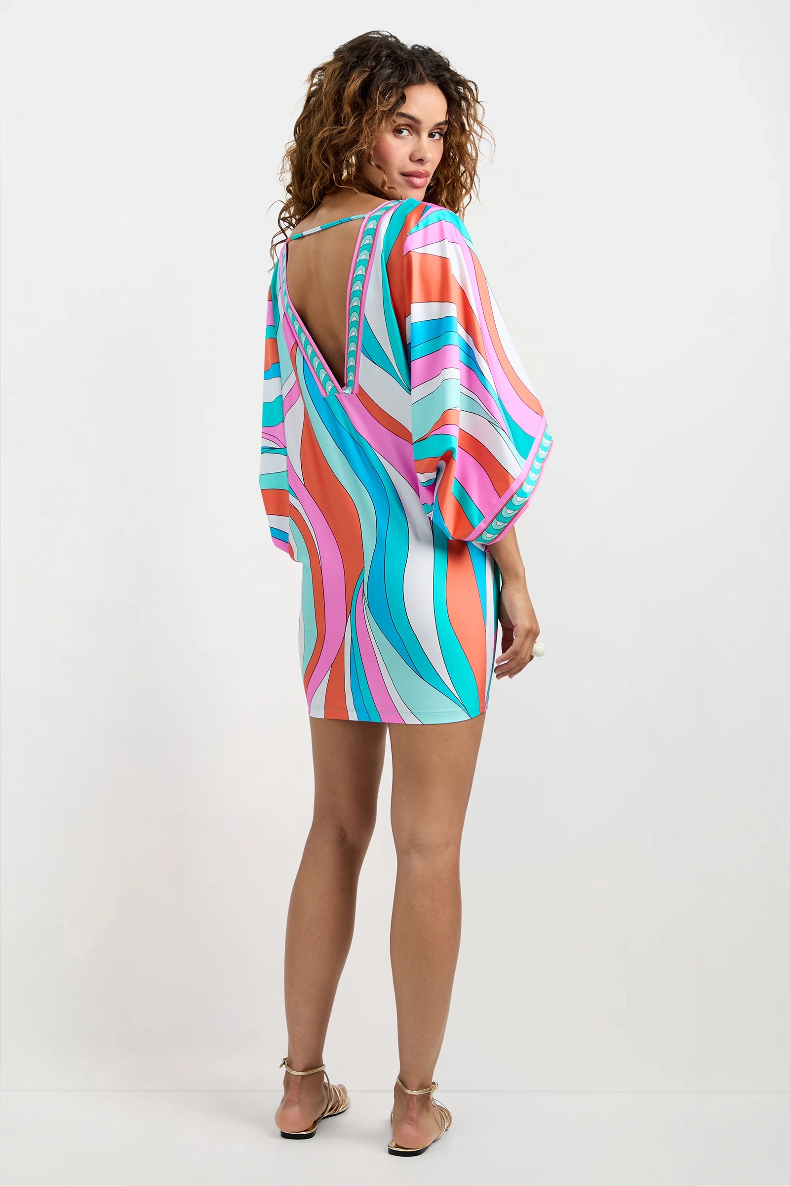 Of course! Please provide the keywords you'd like me to use for the Casablanca Tunic Cover-Up - Apollo.