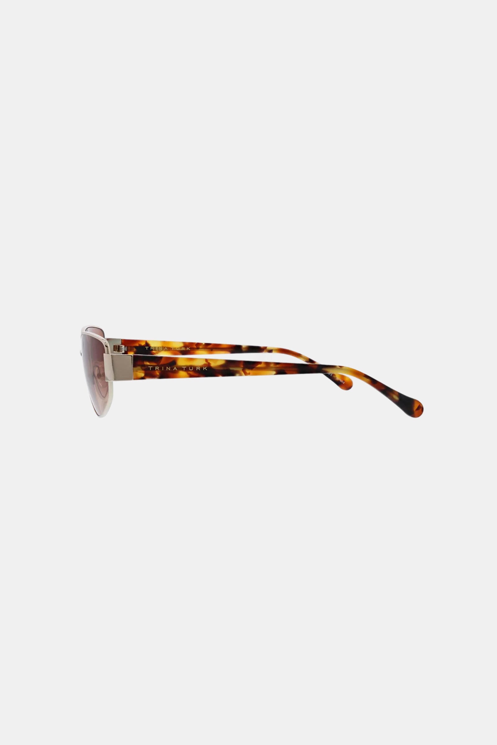 Side view of Dunes Sunglass featuring tortoiseshell-patterned arms and round, lightly tinted lenses, set against a plain white background.