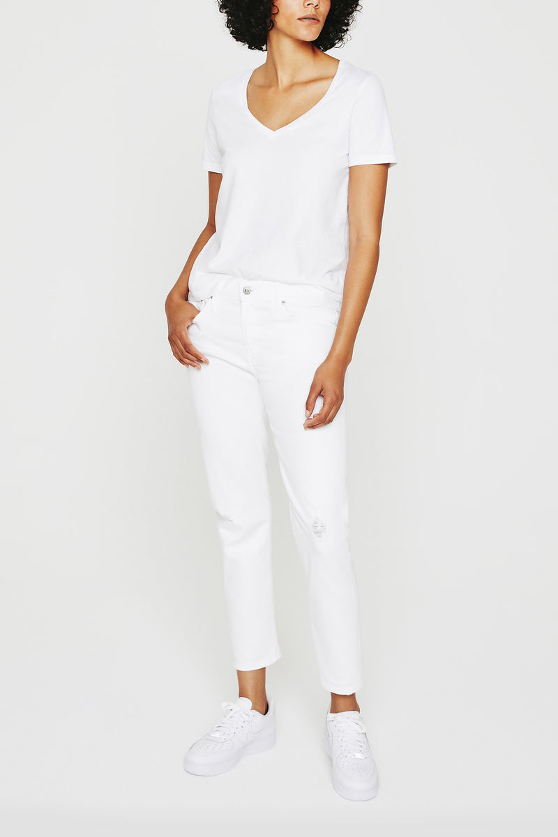 A woman wearing the AG Jager Vee Tee in white.