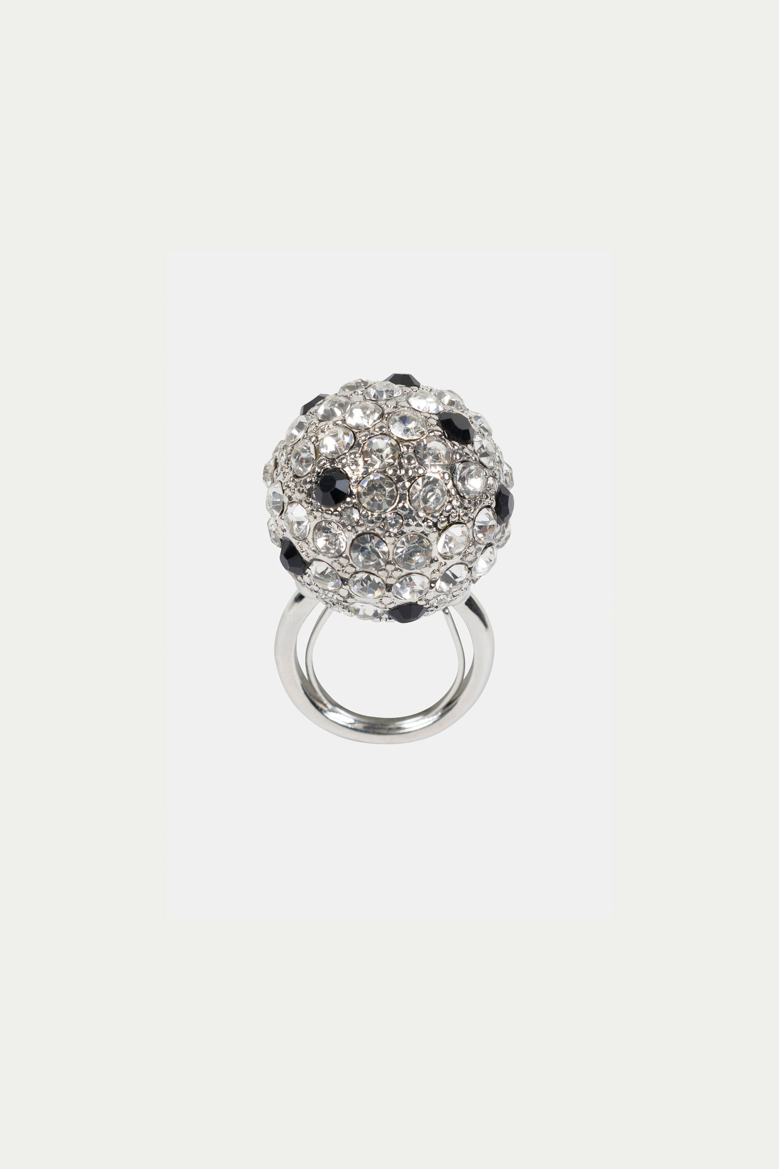 The Cryjet Disco Ball Adjustable Ring is a silver ring with a large, round cluster design featuring sparkling clear and black gemstones on top.