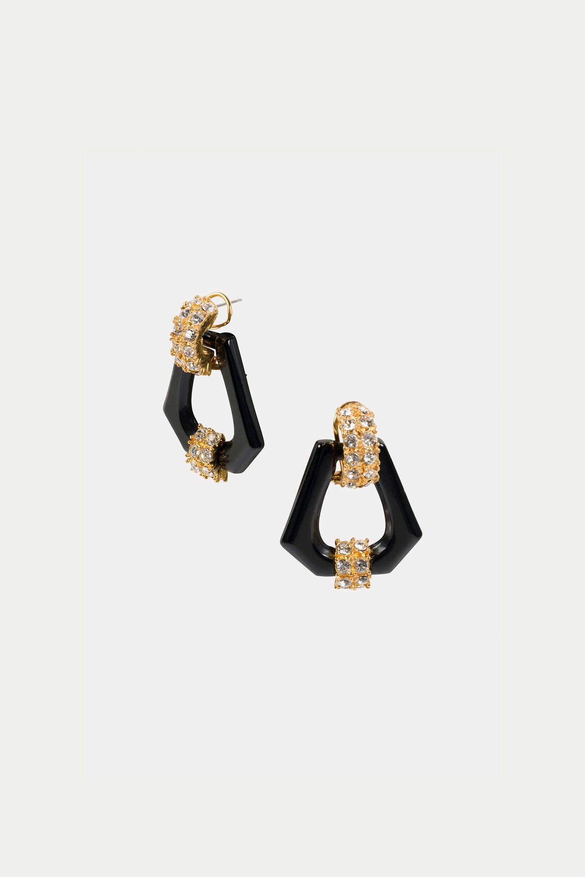The Hexagon Doorknocker Earrings are geometric black earrings with gold and crystal accents, featuring angular shapes and a modern, elegant design, shown against a plain white background.