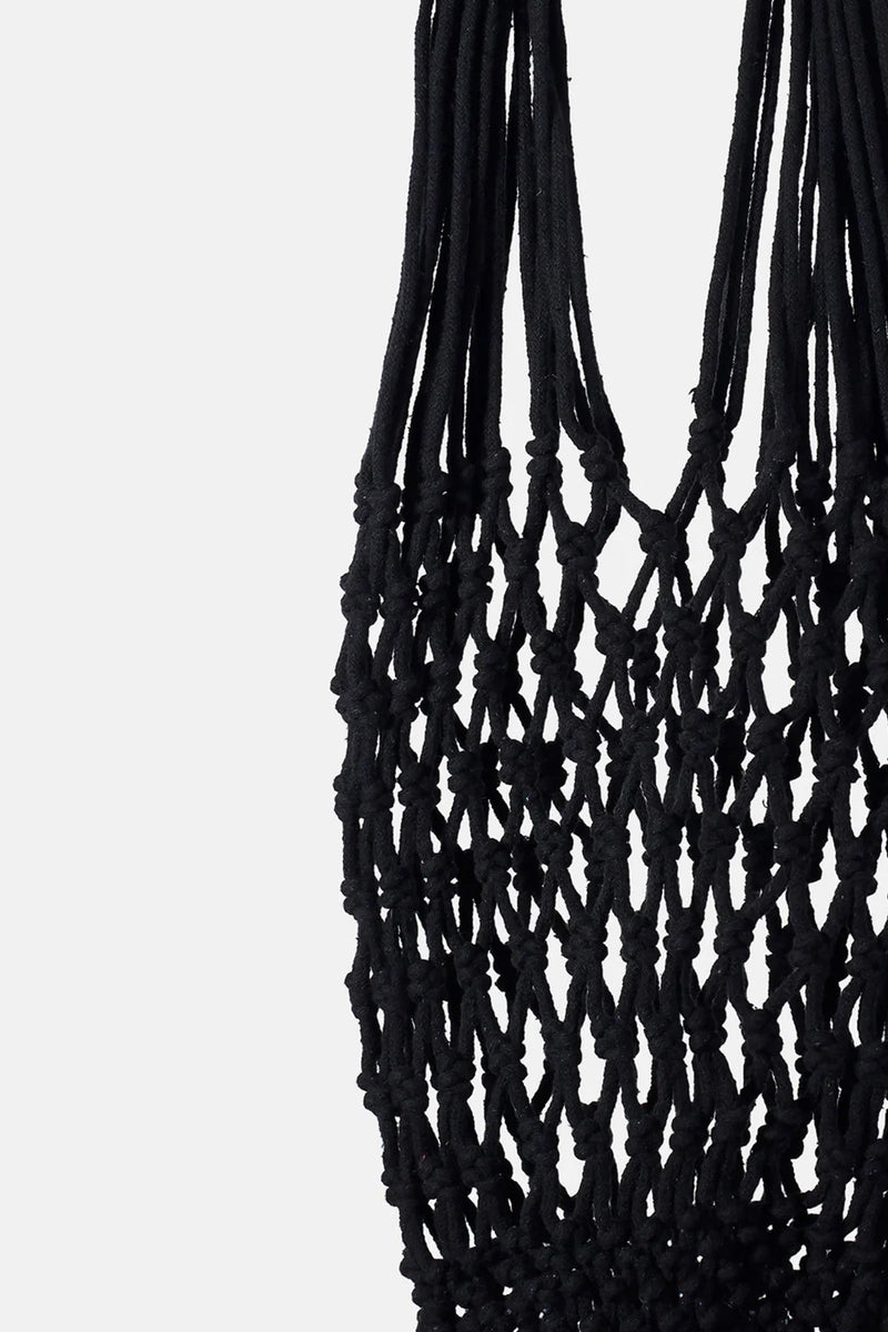 Of course! Please provide the keywords you'd like me to use for the NANNACAY KIM WOVEN BAG.