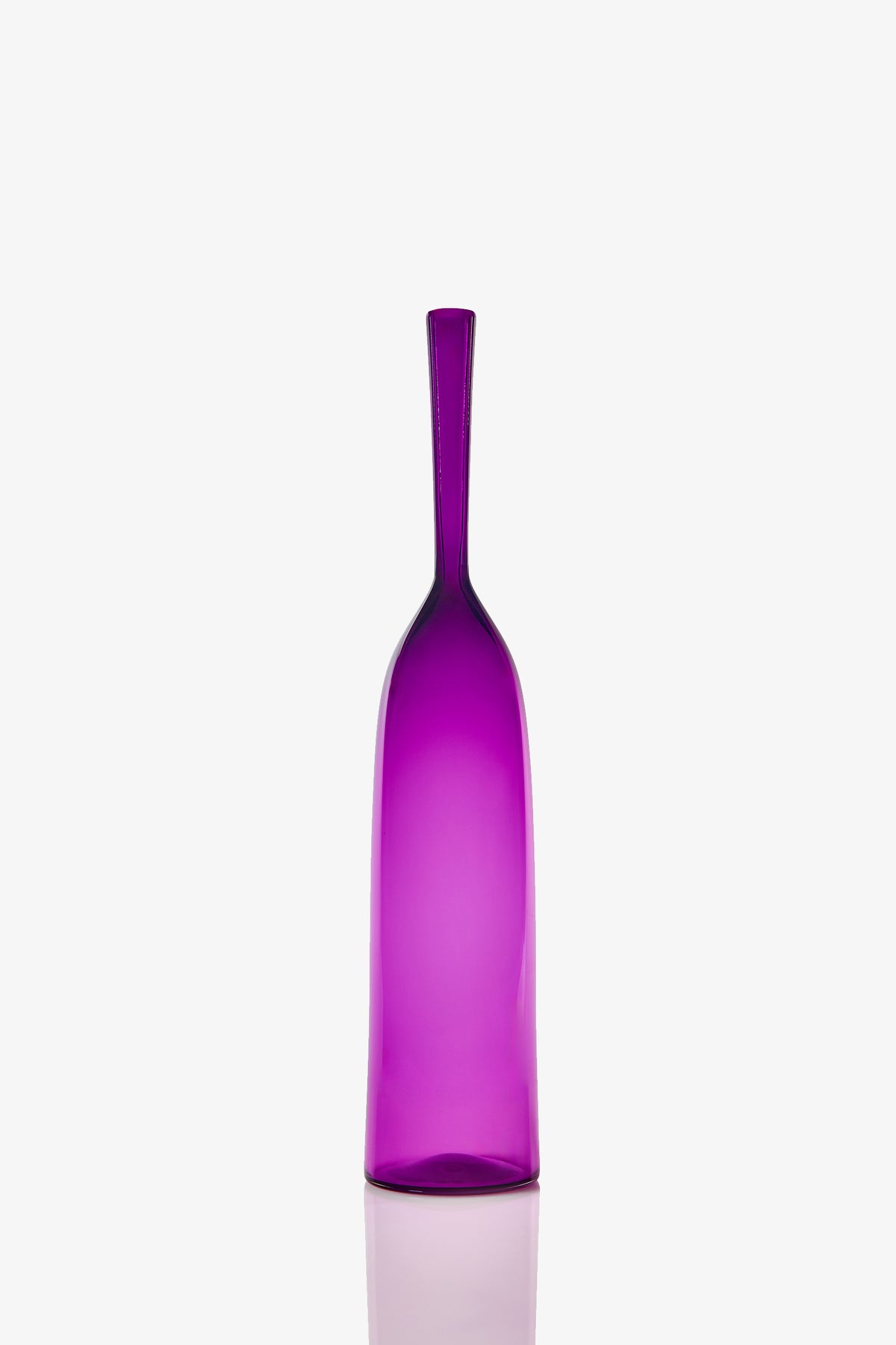 A Large Angelic Bottle, tall and slender with translucent purple glass, stands upright on a white background, reflecting light at its base.