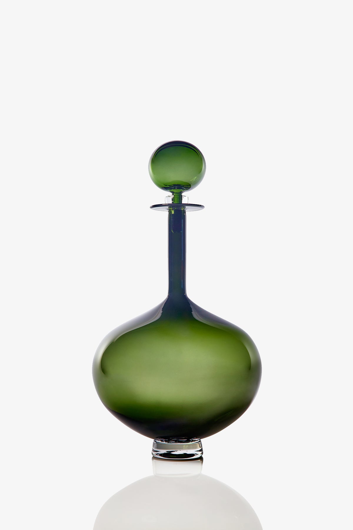 The Large Genie Bottle Decanter, featuring green glass with a round stopper, wide base, and narrow neck, is displayed against a white background.