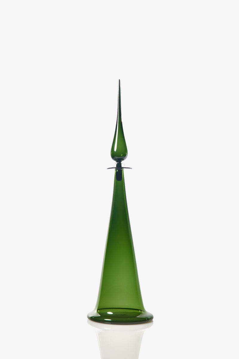 The Large Fluted Cone Decanter is a tall, green glass piece featuring a pointed top and a smooth, cone-shaped base, displayed against a plain white background.